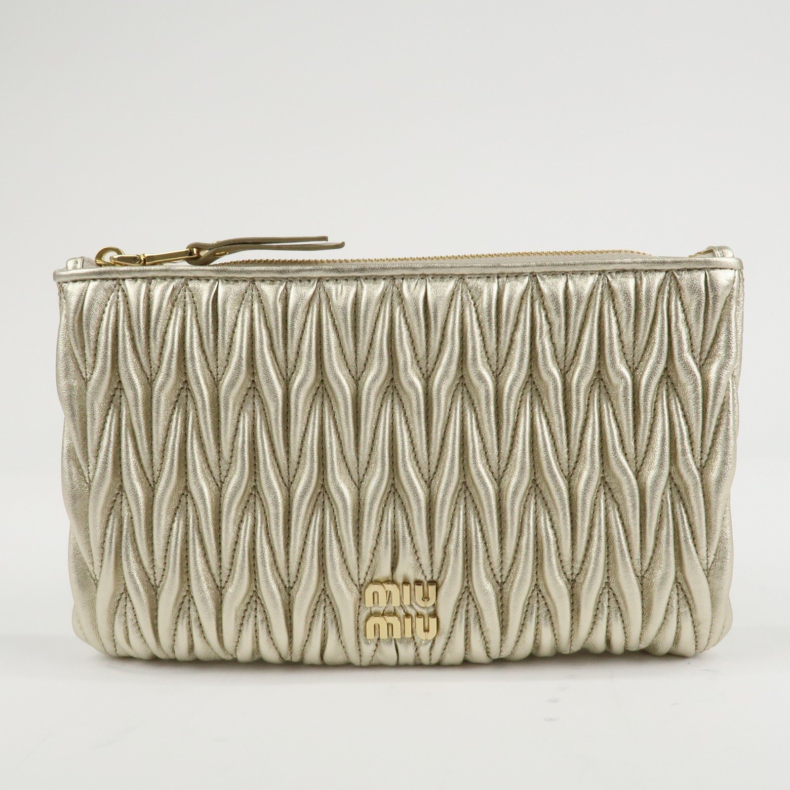 miu miu matelasse leather pouch silk eye mask gold used miu miu matelasse leather pouch silk eye mask gold used
