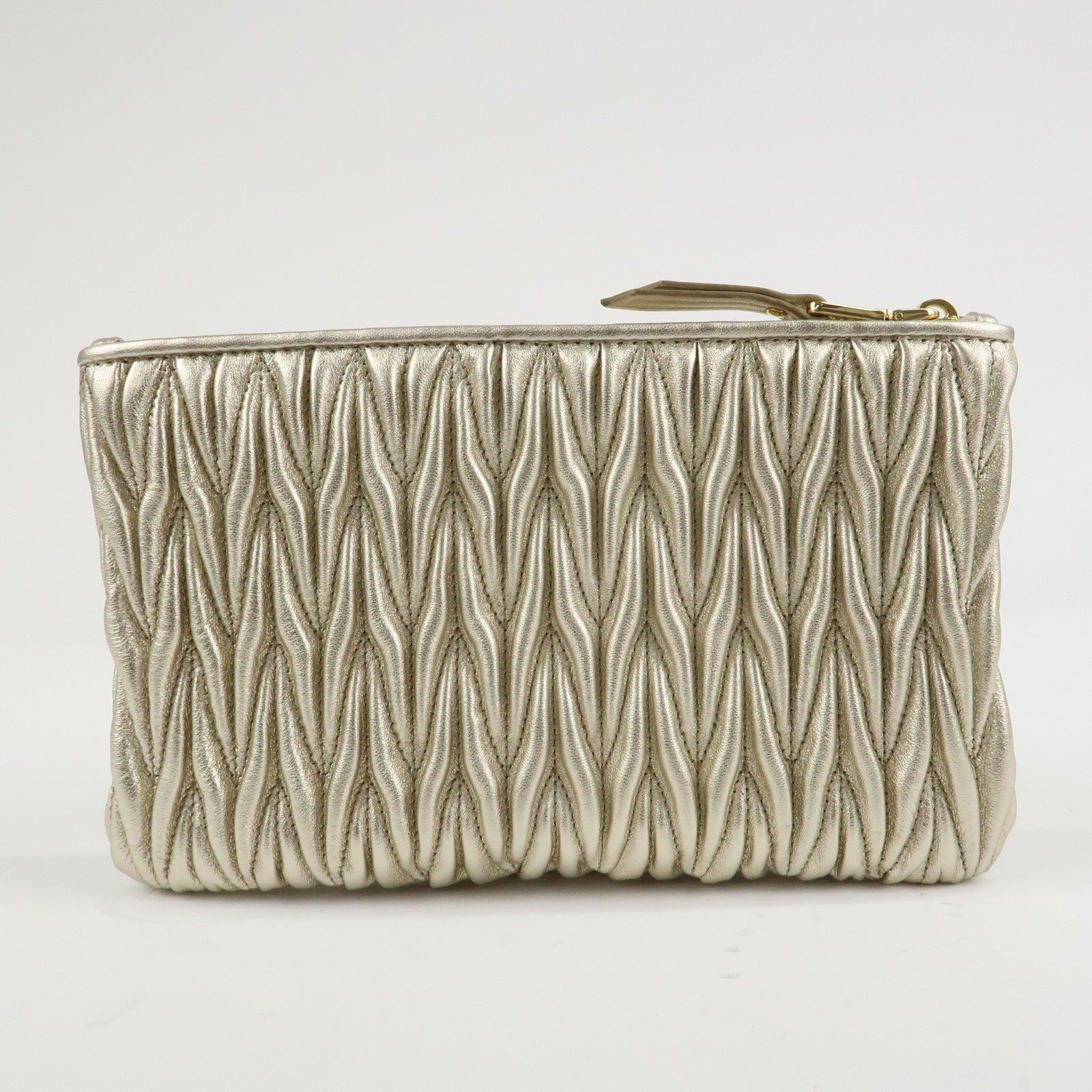 miu miu matelasse leather pouch silk eye mask gold used miu miu matelasse leather pouch silk eye mask gold used