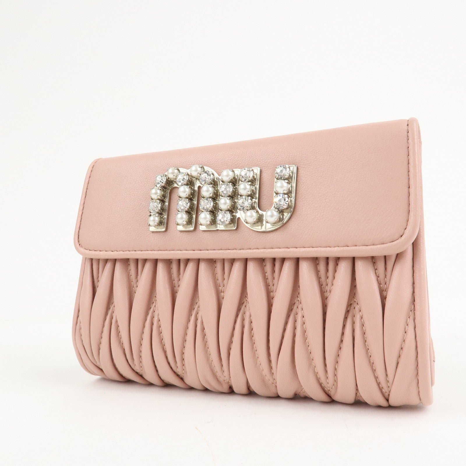 miu miu matelasse leather tri fold wallet pink used miu miu matelasse leather tri fold wallet pink used