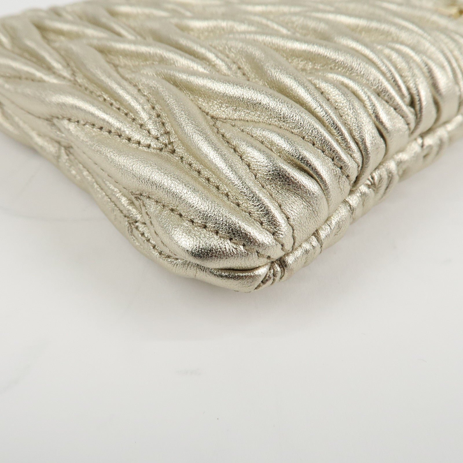 miu miu matelasse leather pouch silk eye mask gold used miu miu matelasse leather pouch silk eye mask gold used