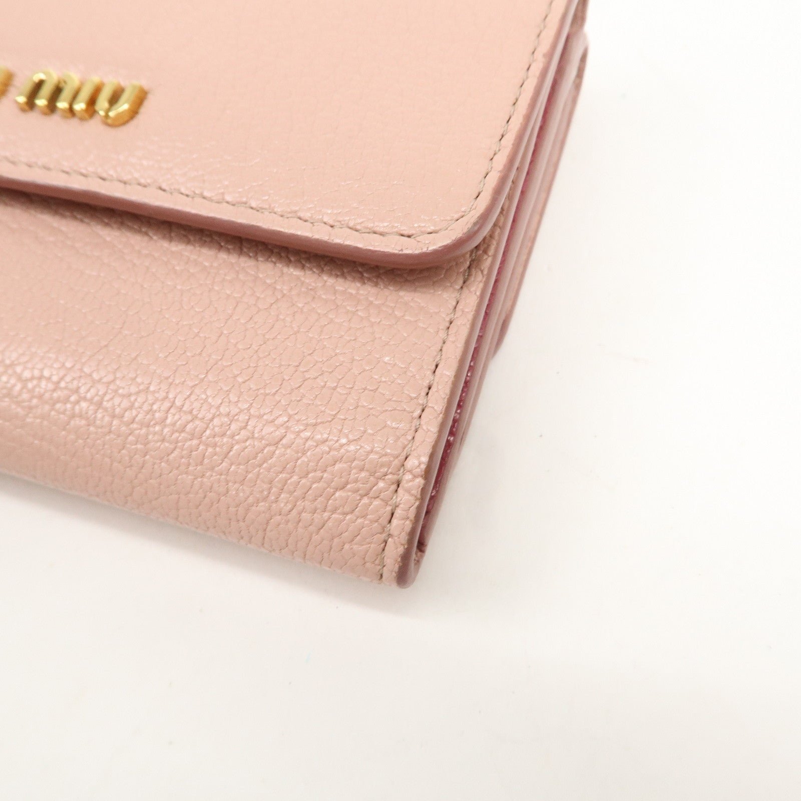 miu miu leather double hook bi fold wallet pink gold hardware used miu miu leather double hook bi fold wallet pink gold hardware used
