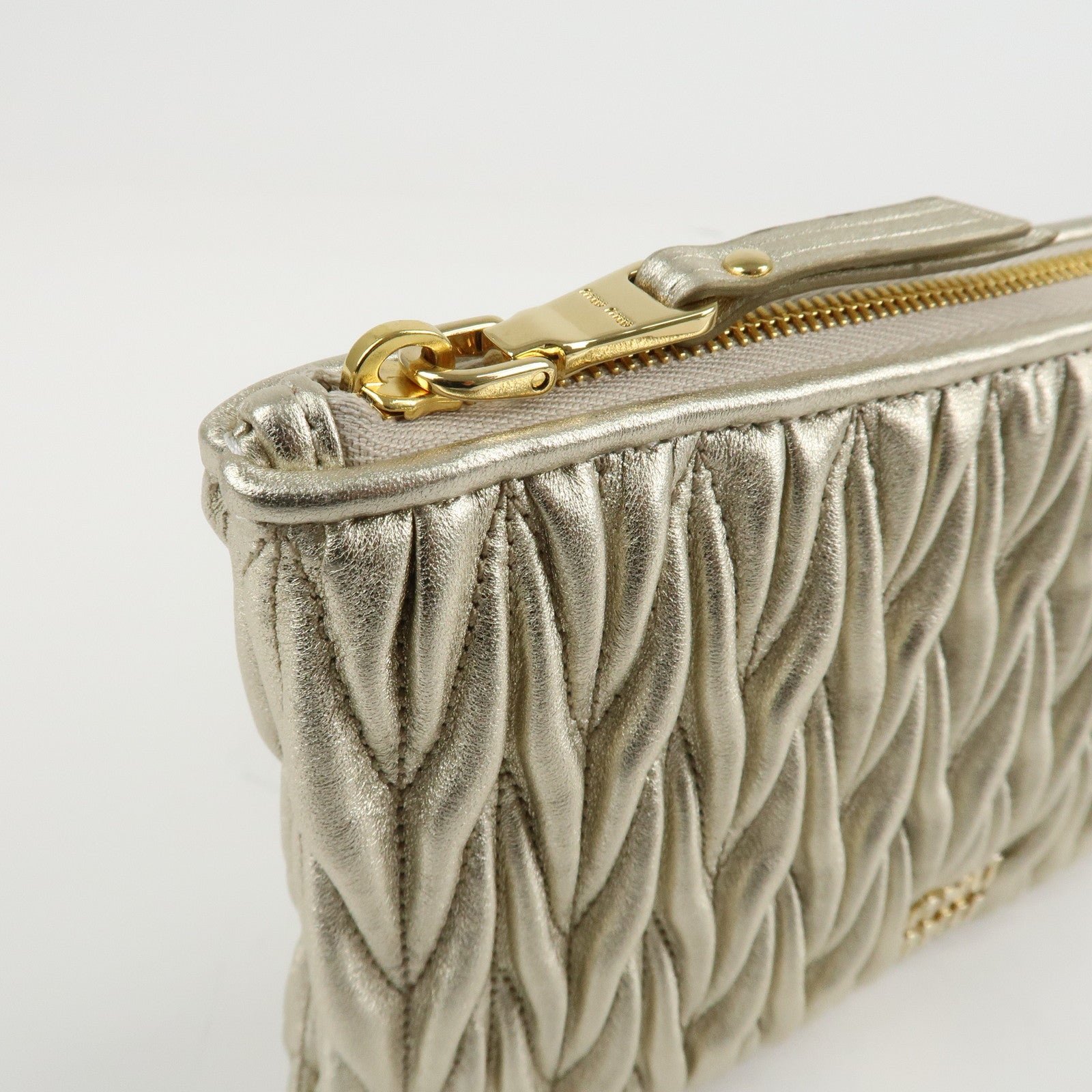 miu miu matelasse leather pouch silk eye mask gold used miu miu matelasse leather pouch silk eye mask gold used