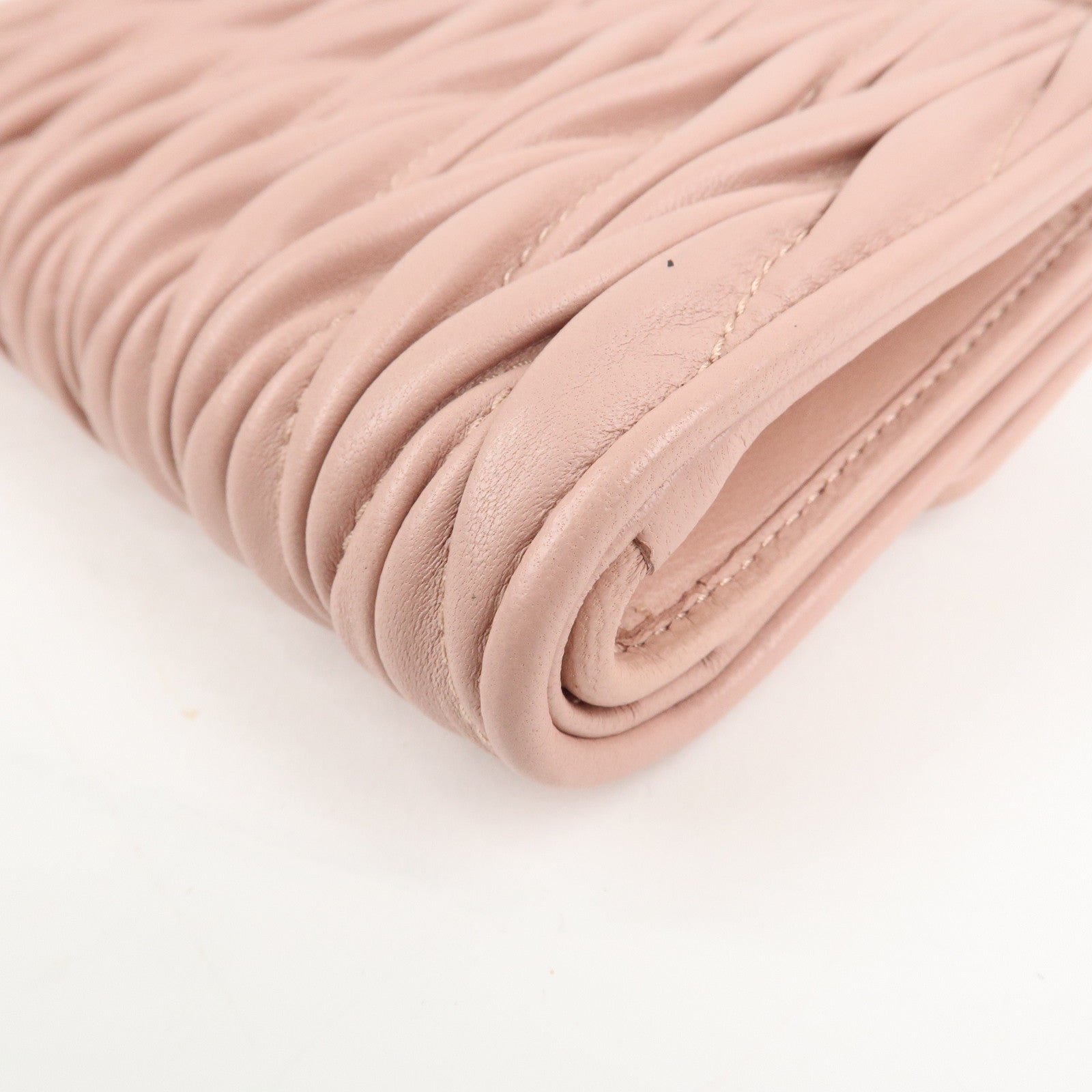 miu miu matelasse leather tri fold wallet pink used miu miu matelasse leather tri fold wallet pink used