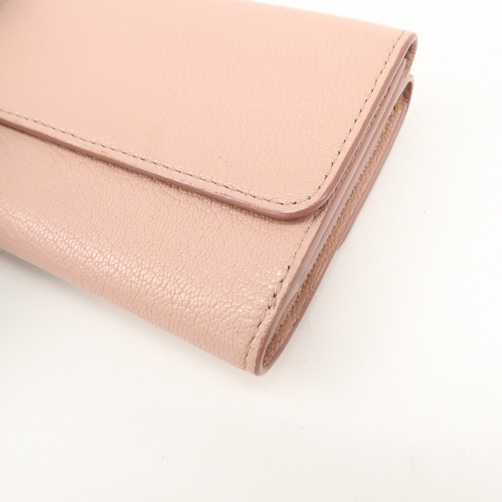 miu miu leather double hook bi fold wallet pink gold hardware used miu miu leather double hook bi fold wallet pink gold hardware used