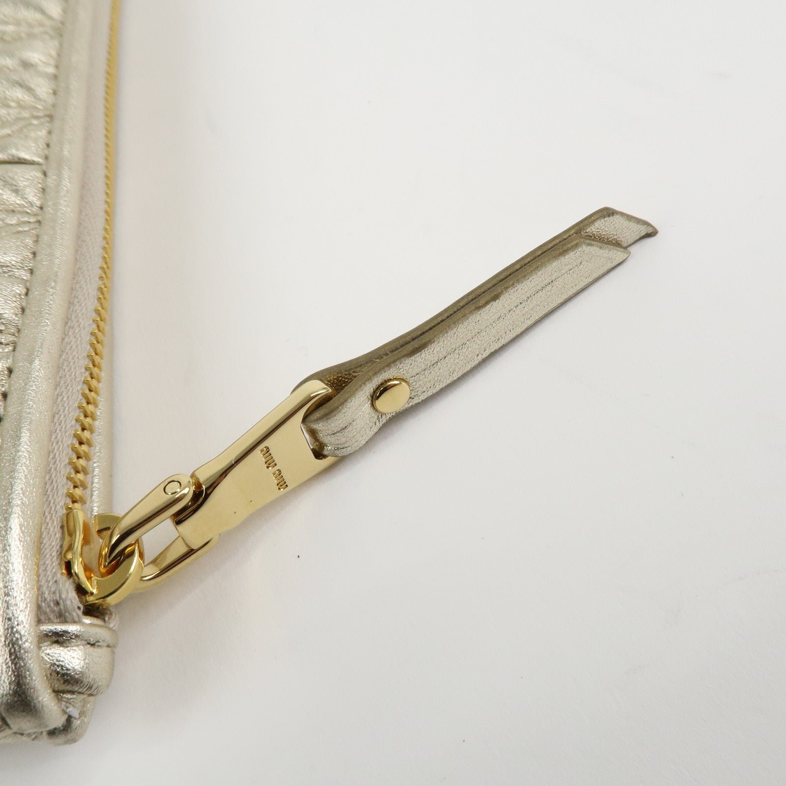 miu miu matelasse leather pouch silk eye mask gold used miu miu matelasse leather pouch silk eye mask gold used