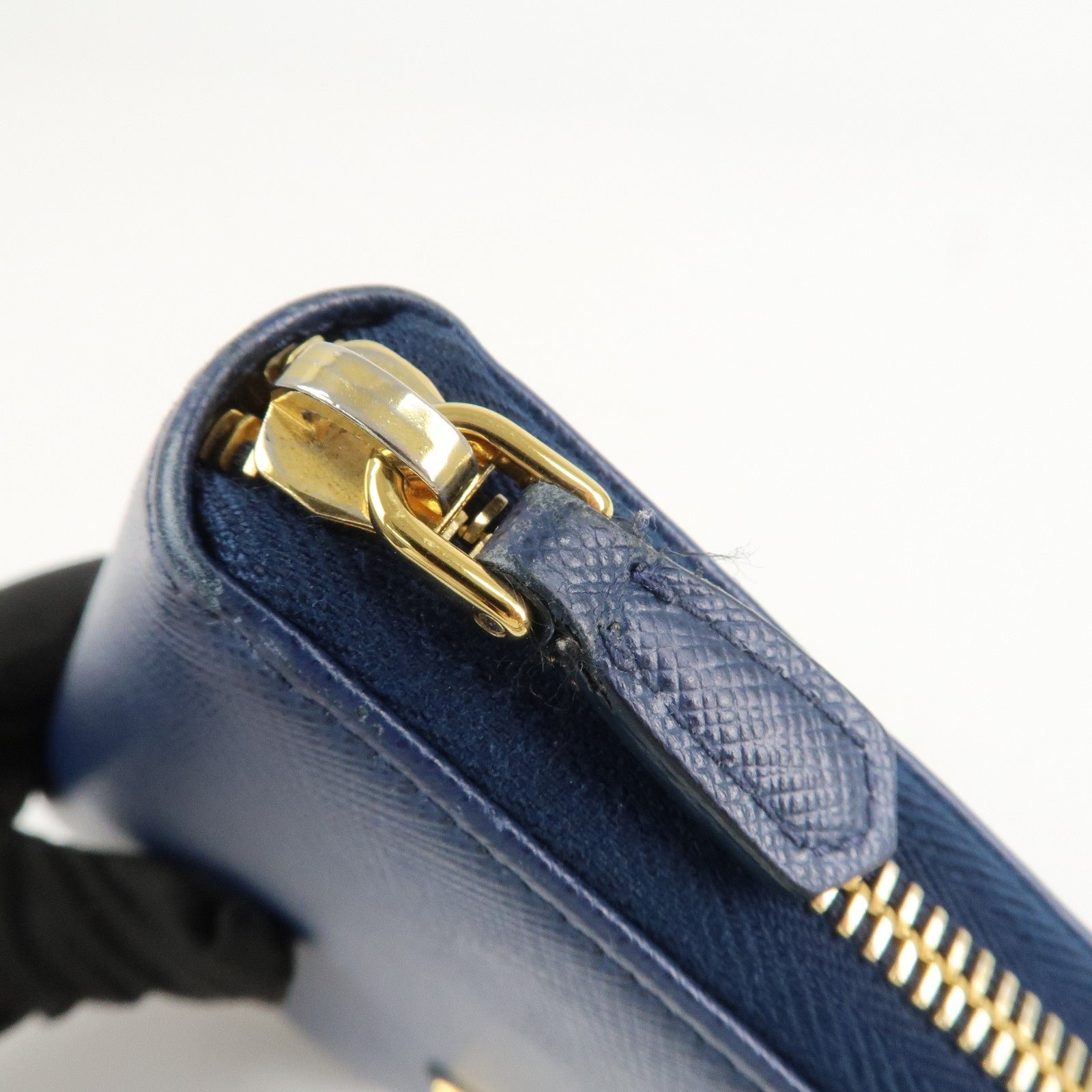 prada triangle logo saffiano leather zippy long wallet navy 1ml506 prada triangle logo saffiano leather zippy long wallet navy 1ml506