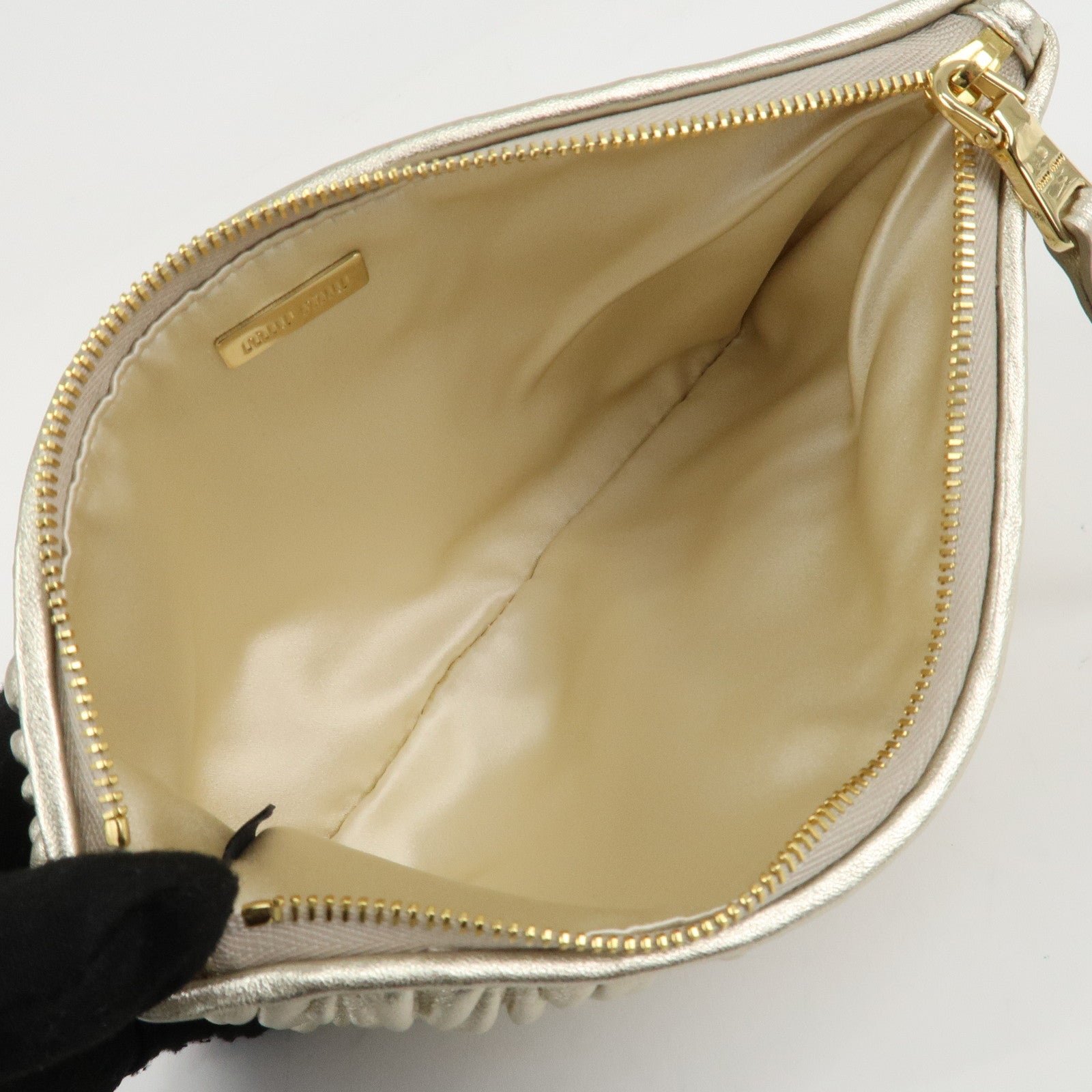 miu miu matelasse leather pouch silk eye mask gold used miu miu matelasse leather pouch silk eye mask gold used