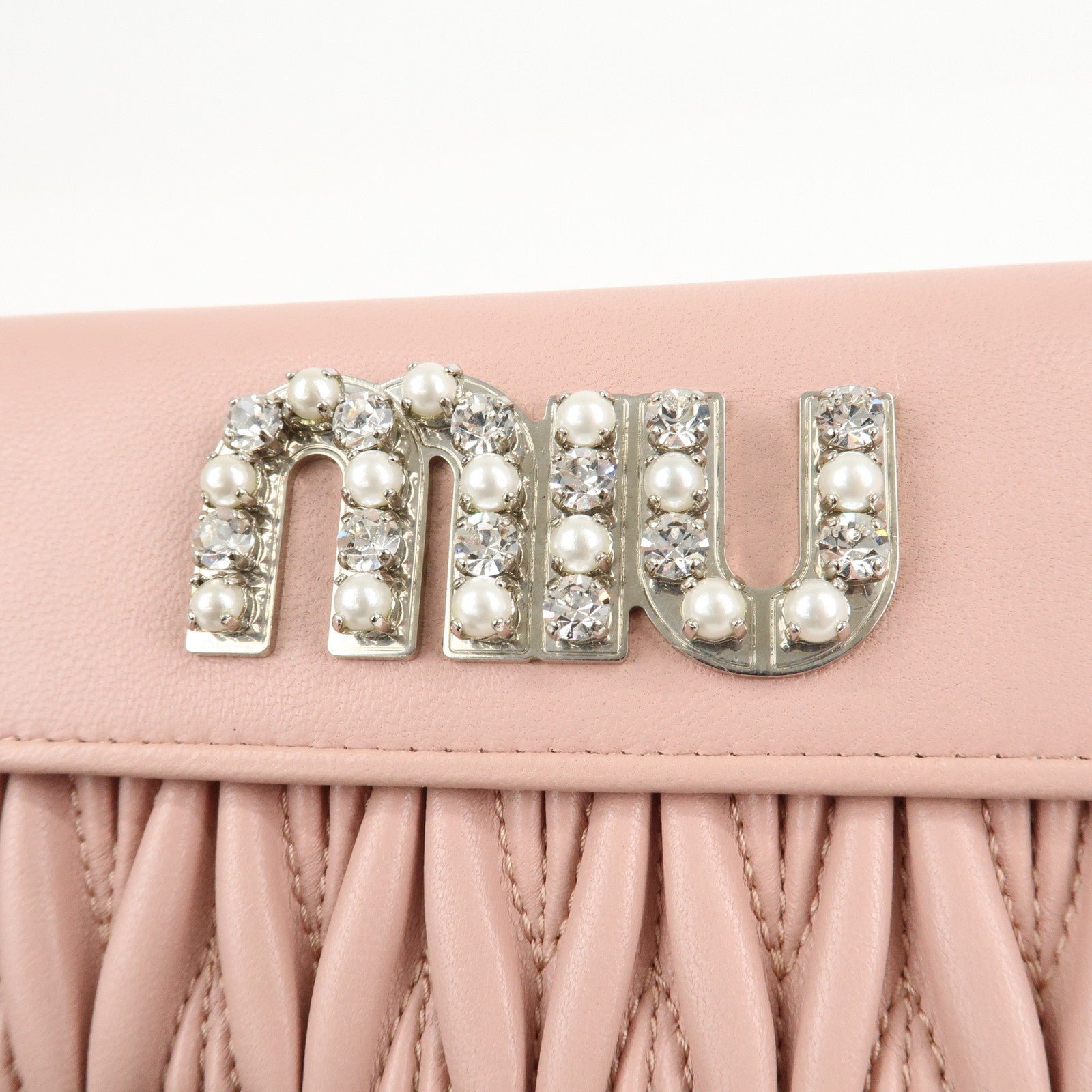 miu miu matelasse leather tri fold wallet pink used miu miu matelasse leather tri fold wallet pink used