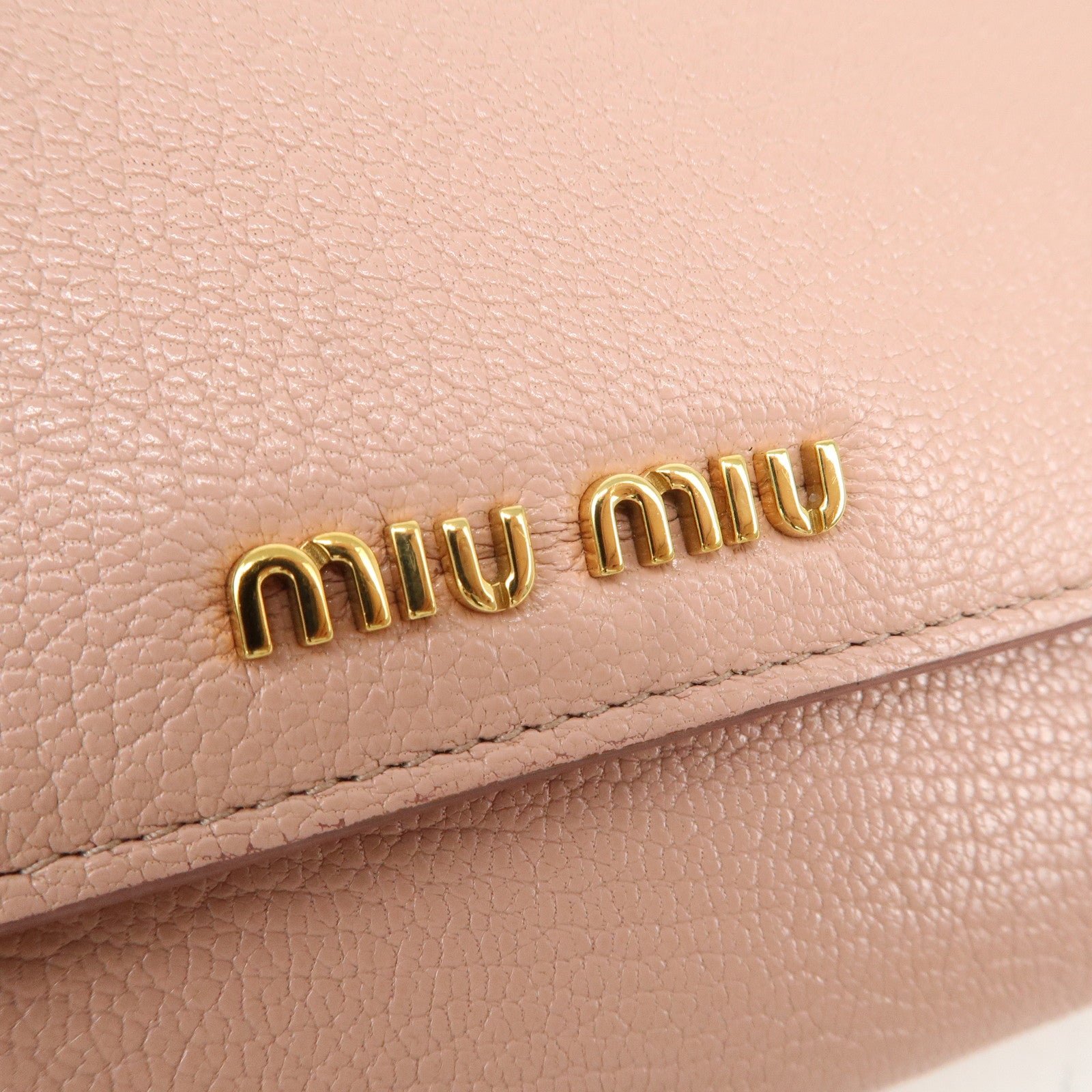 miu miu leather double hook bi fold wallet pink gold hardware used miu miu leather double hook bi fold wallet pink gold hardware used