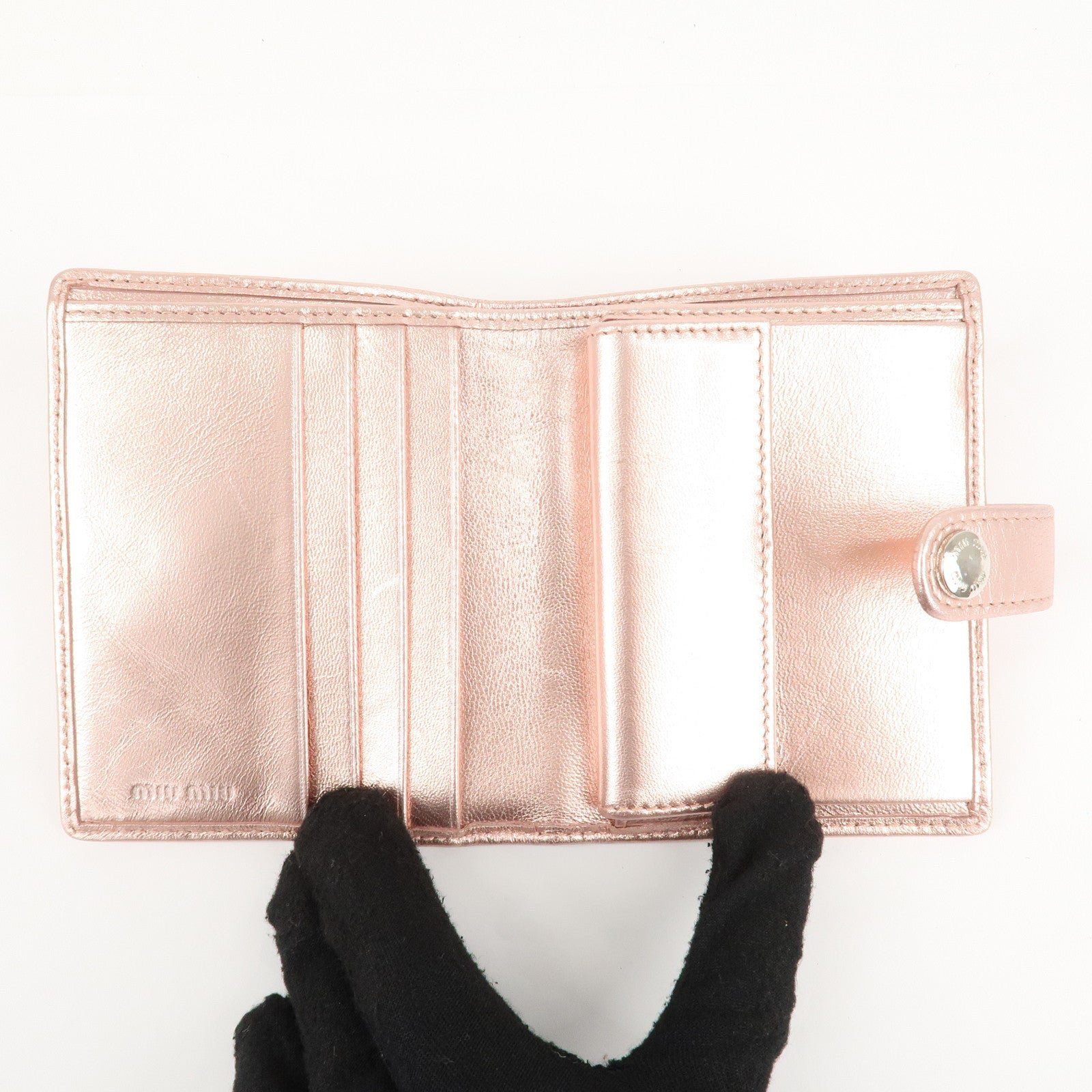 miu miu matelasse leather bi fold wallet metalic pink 5mv016 used miu miu matelasse leather bi fold wallet metalic pink 5mv016 used