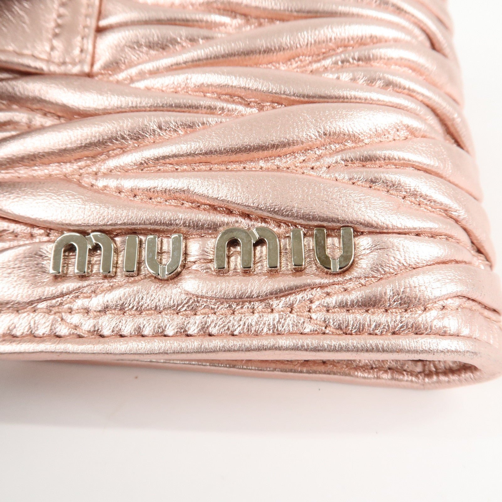 miu miu matelasse leather bi fold wallet metalic pink 5mv016 used miu miu matelasse leather bi fold wallet metalic pink 5mv016 used