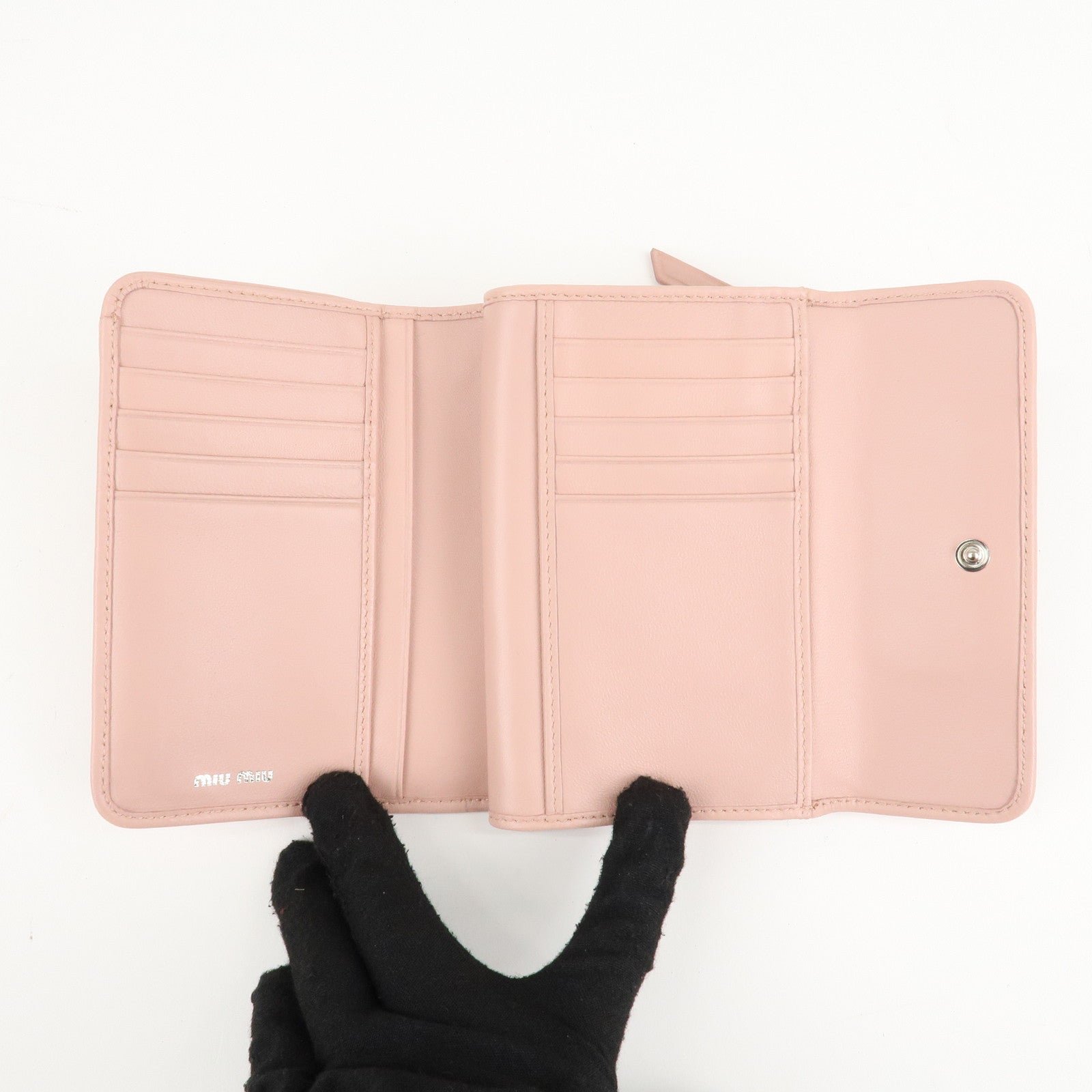 miu miu matelasse leather tri fold wallet pink used miu miu matelasse leather tri fold wallet pink used