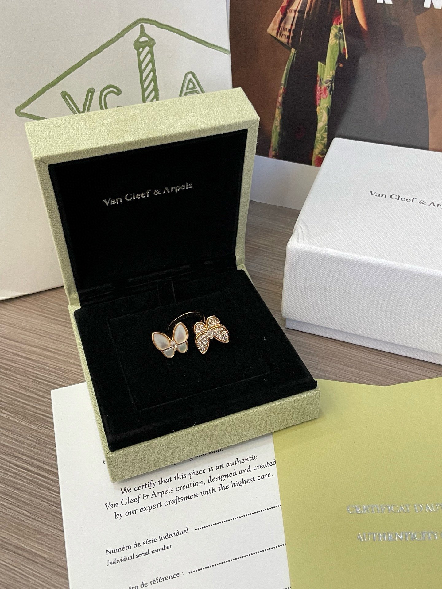 two butterfly between the finger ring two butterfly between the finger ring