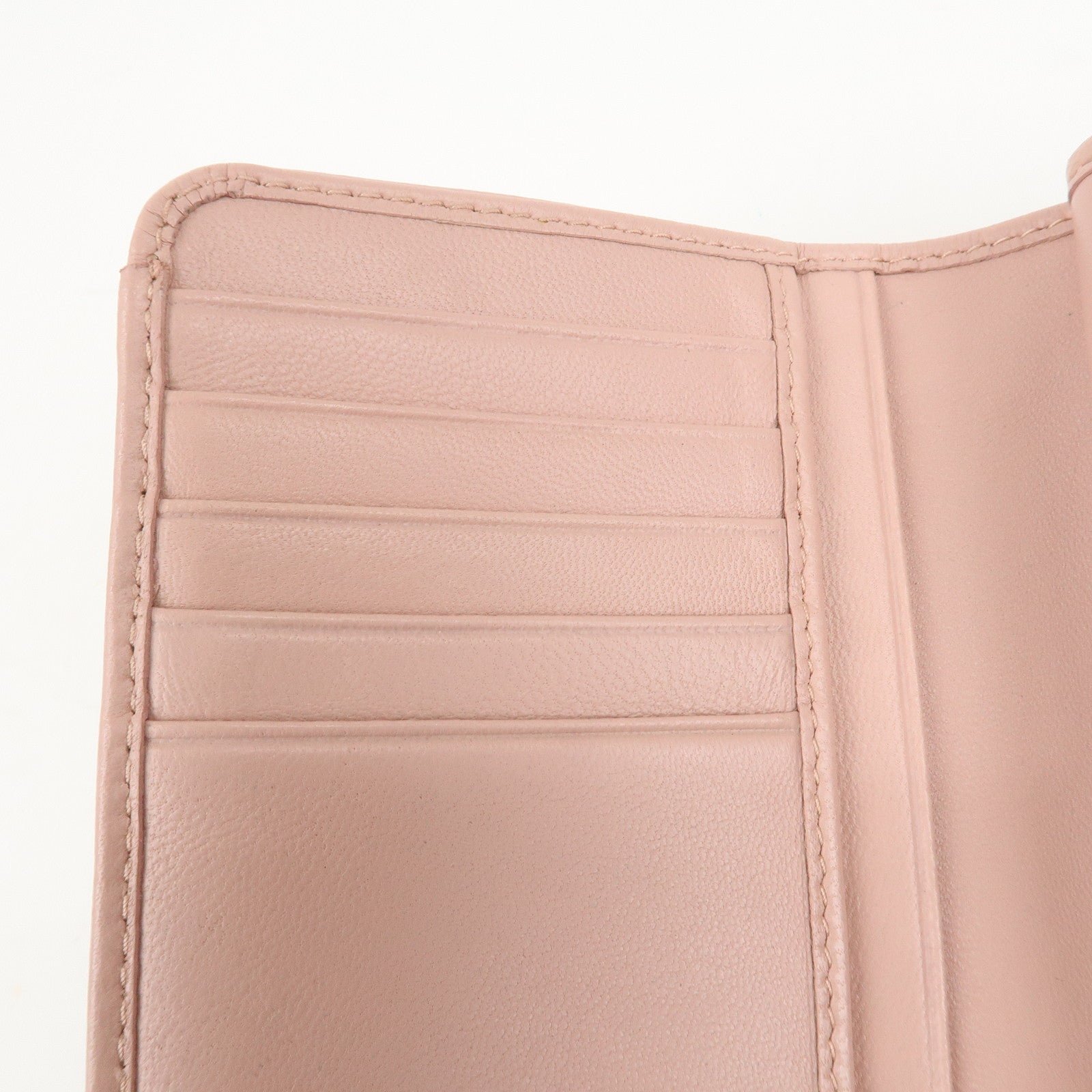 miu miu matelasse leather tri fold wallet pink used miu miu matelasse leather tri fold wallet pink used