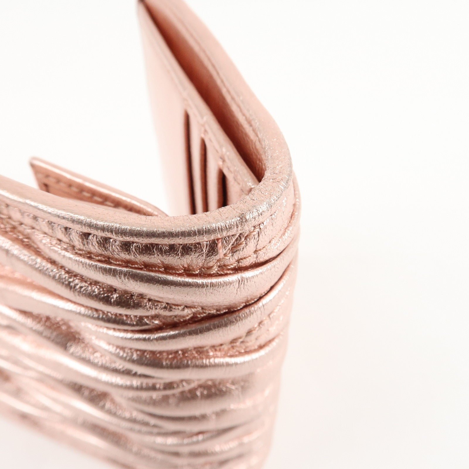 miu miu matelasse leather bi fold wallet metalic pink 5mv016 used miu miu matelasse leather bi fold wallet metalic pink 5mv016 used