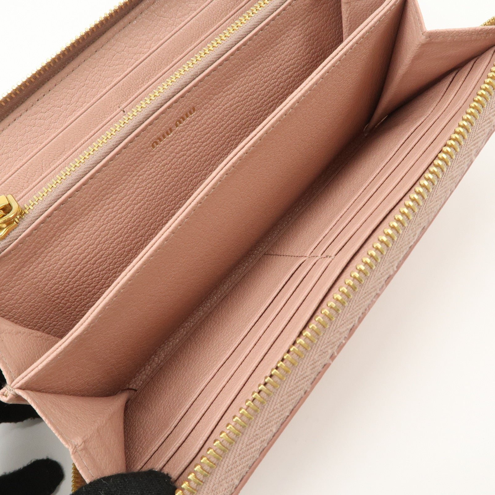 miu miu leather zip around wallet zippy wallet long wallet pink 5ml506 used miu miu leather zip around wallet zippy wallet long wallet pink 5ml506 used
