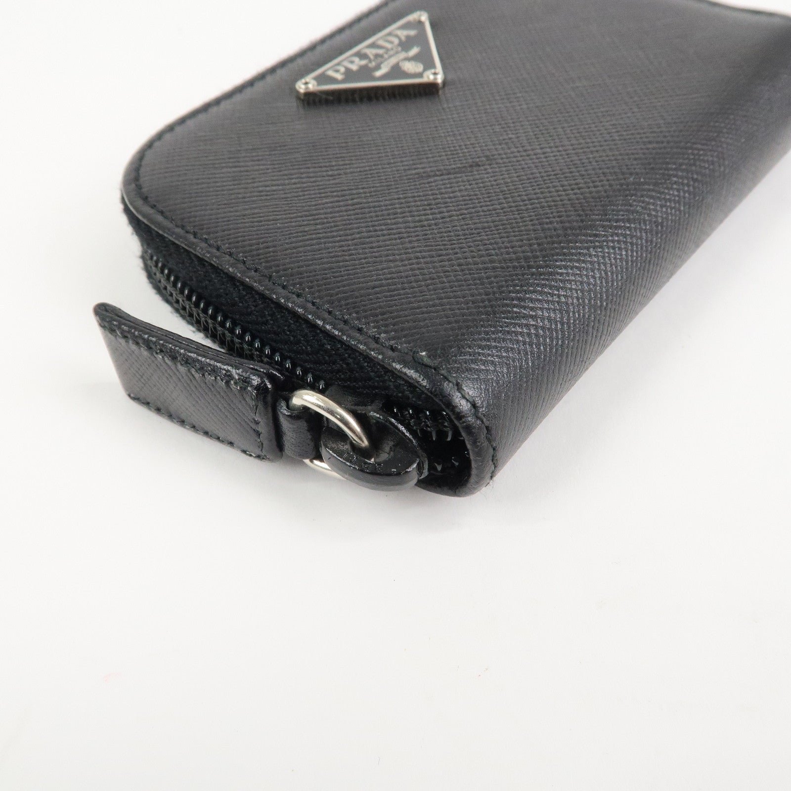 prada triangle logo saffiano leather round zippy coin case black prada triangle logo saffiano leather round zippy coin case black