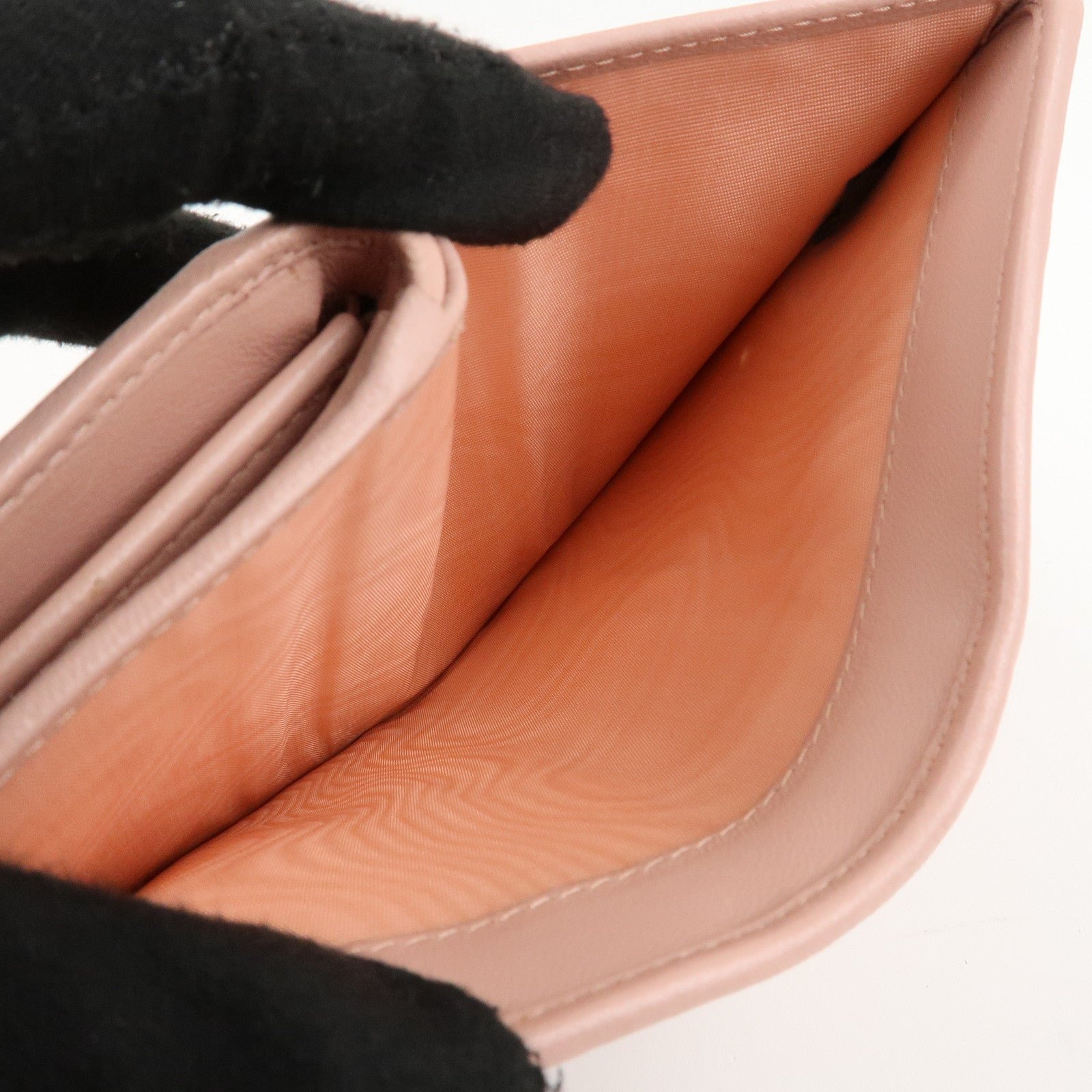 miu miu matelasse leather tri fold wallet pink used miu miu matelasse leather tri fold wallet pink used