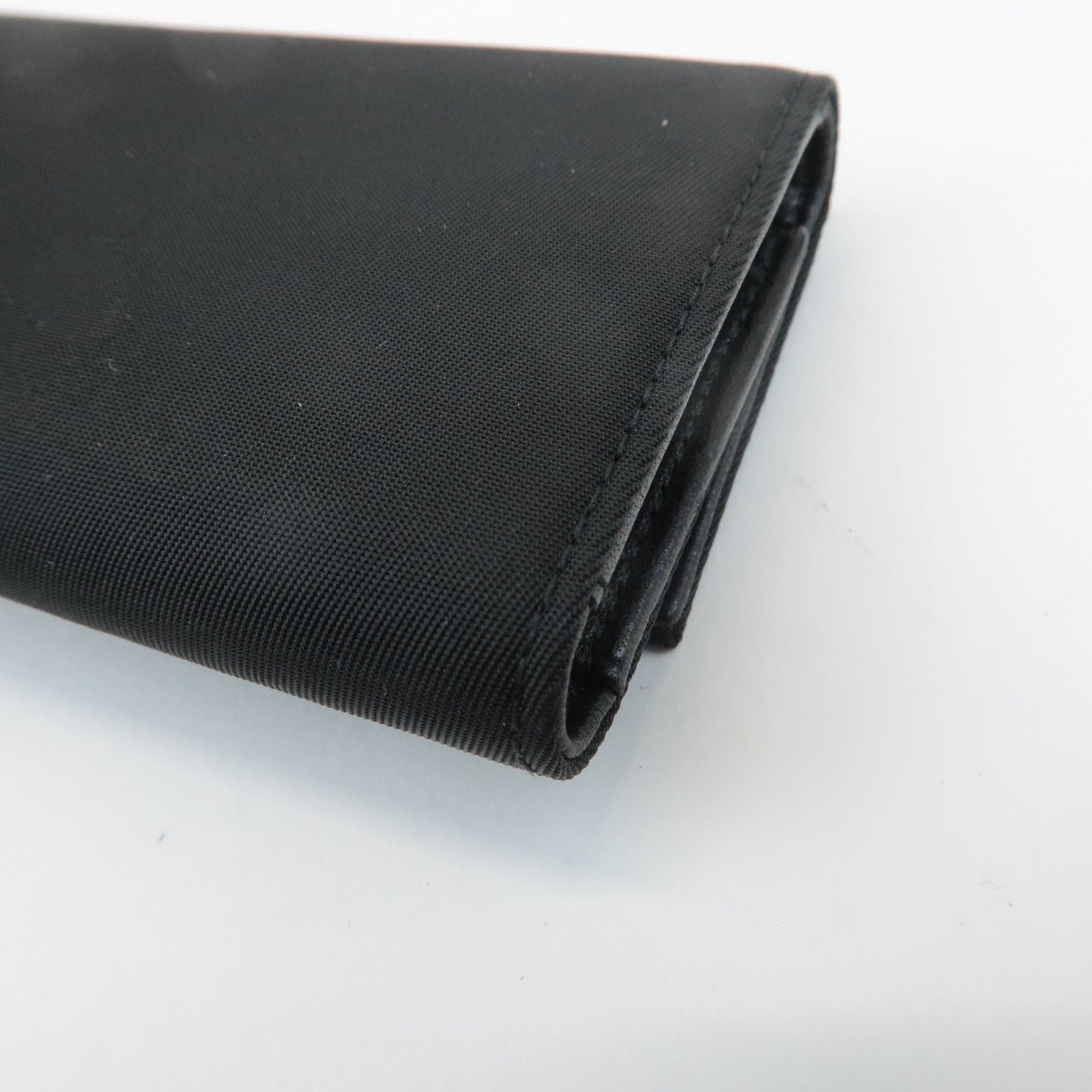prada triangle logo nylon 6 key case key holder black m26x used prada triangle logo nylon 6 key case key holder black m26x used