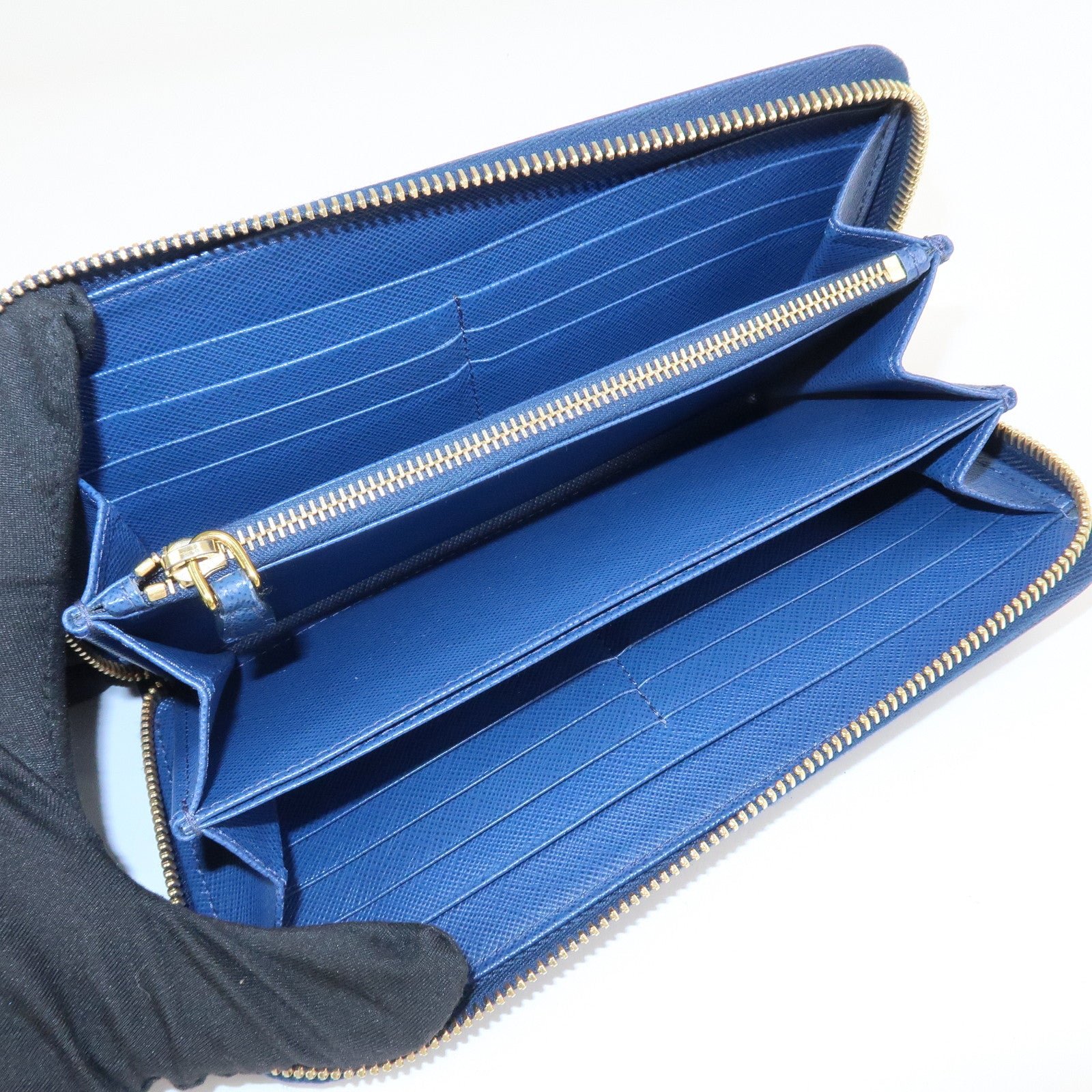 prada triangle logo saffiano leather zippy long wallet navy 1ml506 prada triangle logo saffiano leather zippy long wallet navy 1ml506