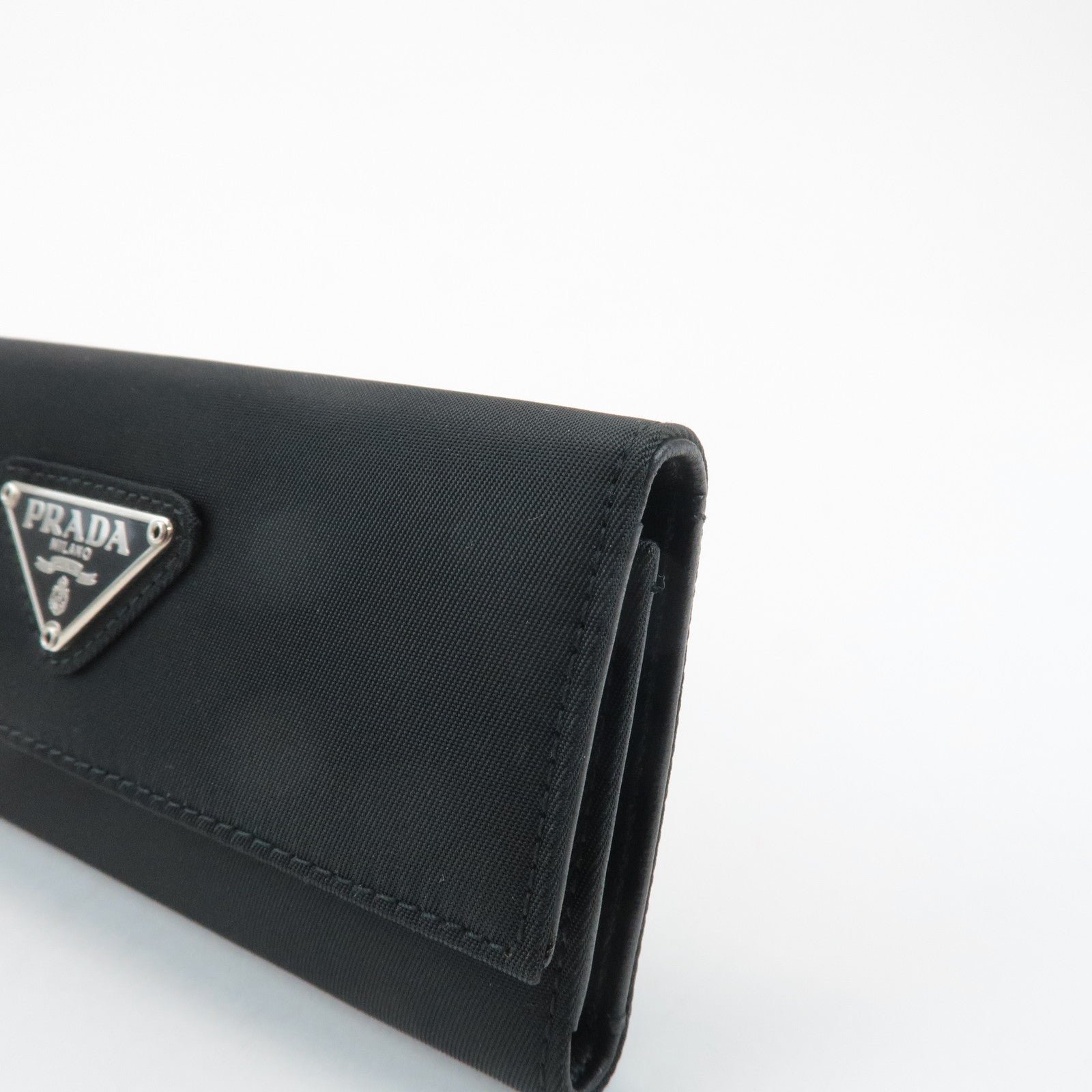 prada triangle logo nylon 6 key case key holder black m26x used prada triangle logo nylon 6 key case key holder black m26x used