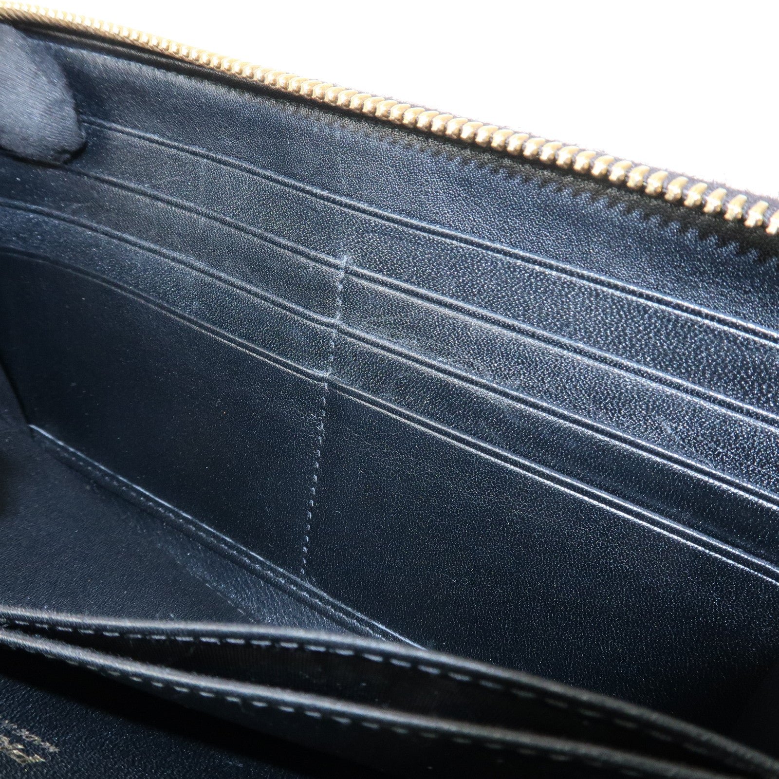 prada vitello move leather round zippy wallet black 1ml506 used prada vitello move leather round zippy wallet black 1ml506 used