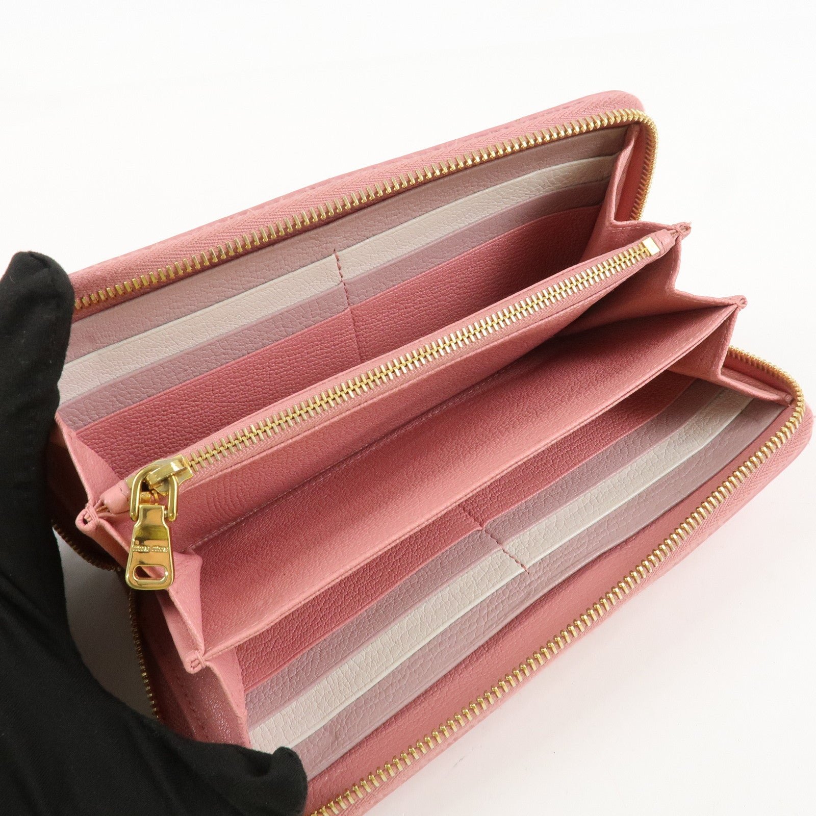 miu miu leather round zippy wallet long wallet pink 5ml506 used miu miu leather round zippy wallet long wallet pink 5ml506 used
