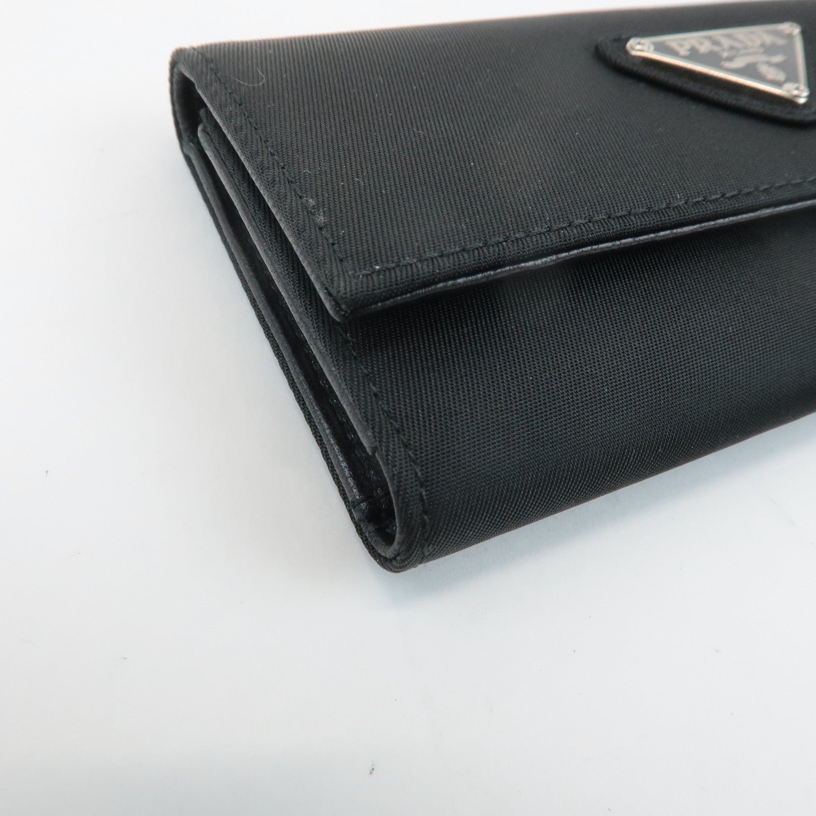 prada triangle logo nylon 6 key case key holder black m26x used prada triangle logo nylon 6 key case key holder black m26x used