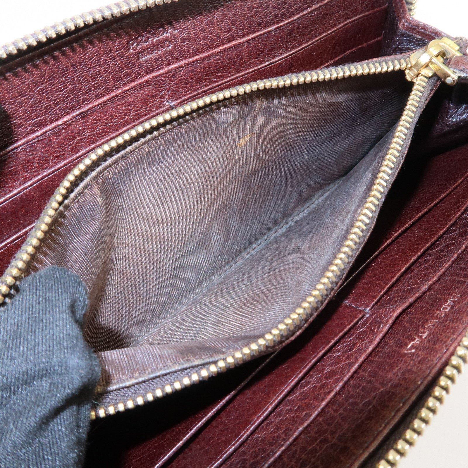 prada saffiano leather round zippy long wallet brown 1m0506 used prada saffiano leather round zippy long wallet brown 1m0506 used