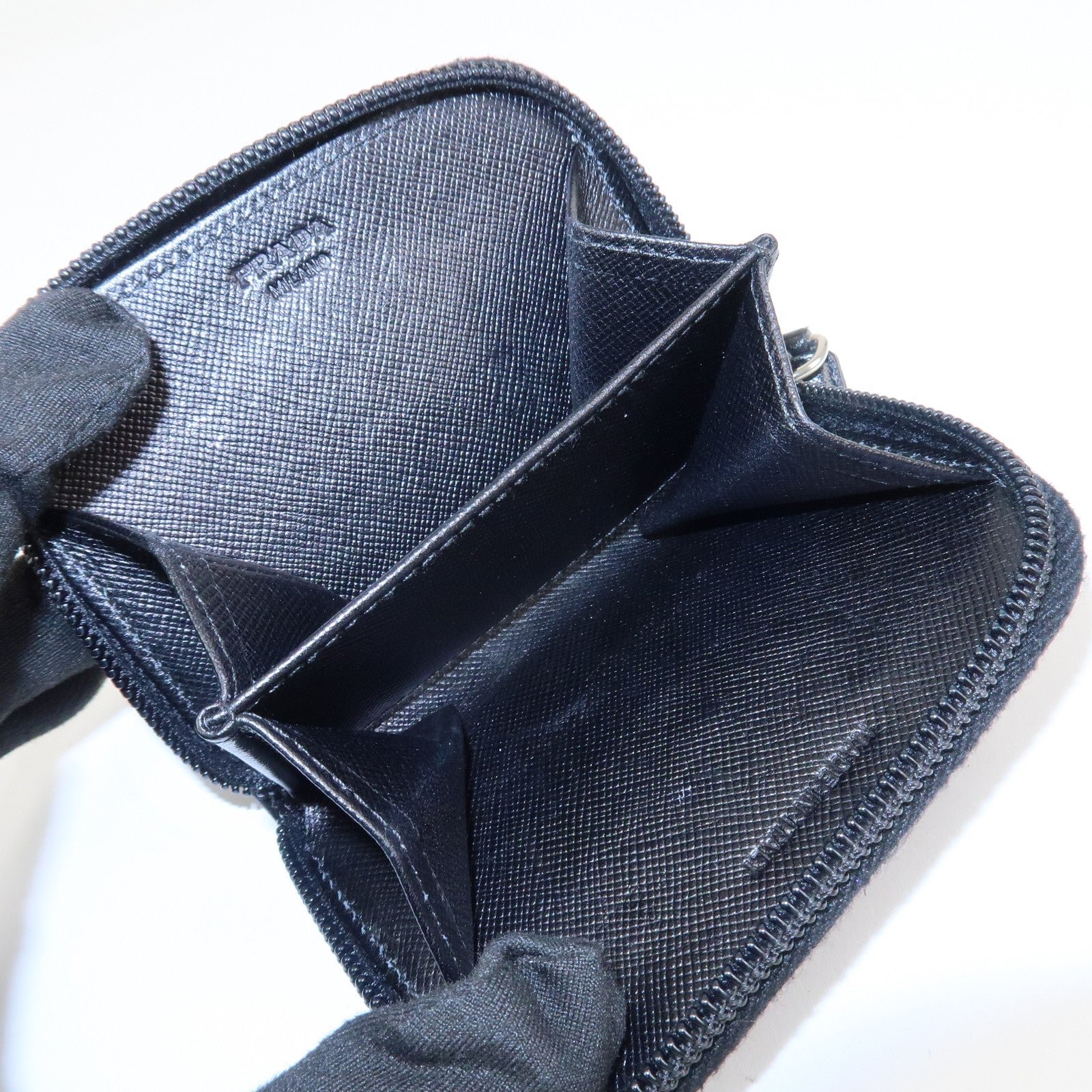 prada triangle logo saffiano leather round zippy coin case black prada triangle logo saffiano leather round zippy coin case black