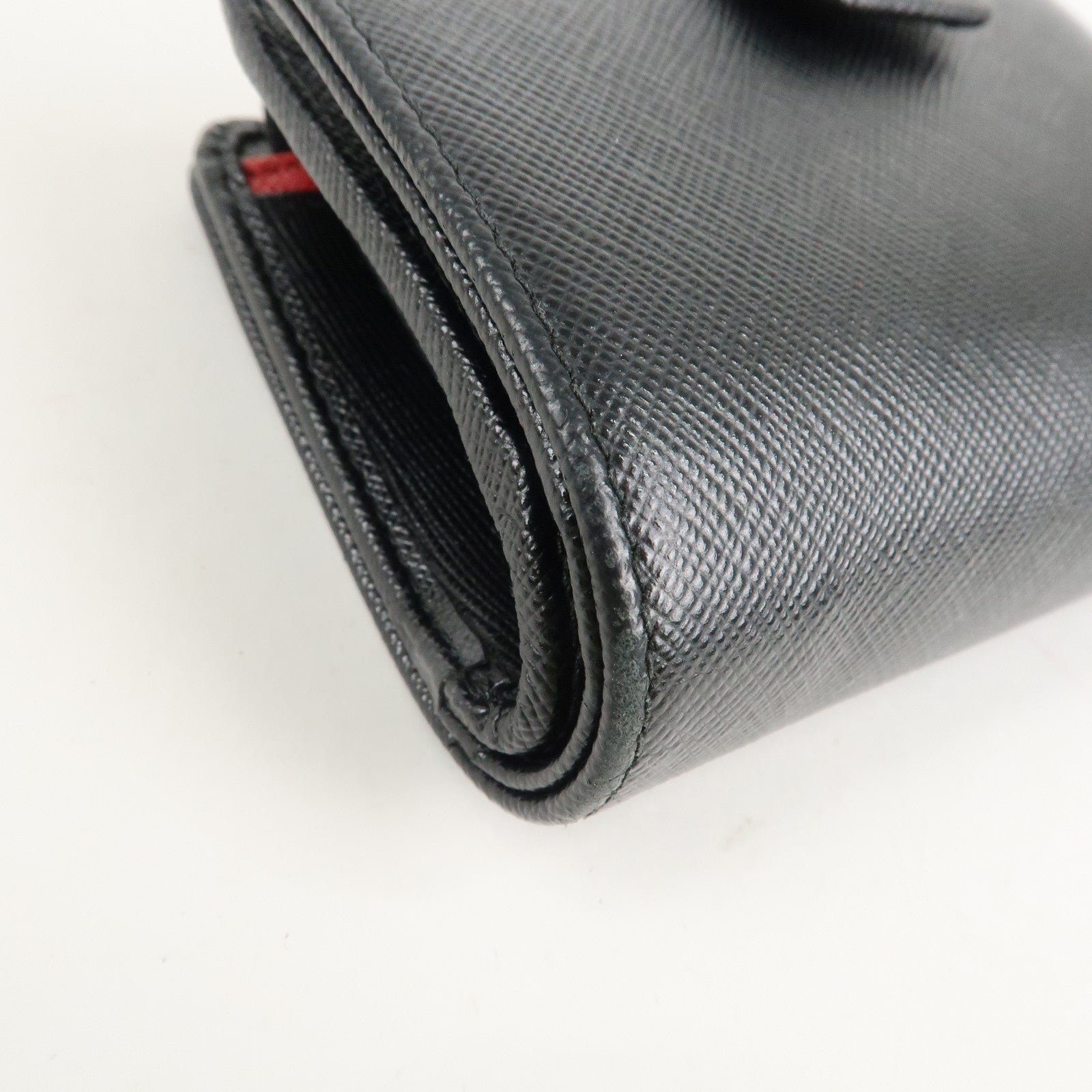 prada saffiano leather bi fold wallet black red gold 1ml018 used prada saffiano leather bi fold wallet black red gold 1ml018 used