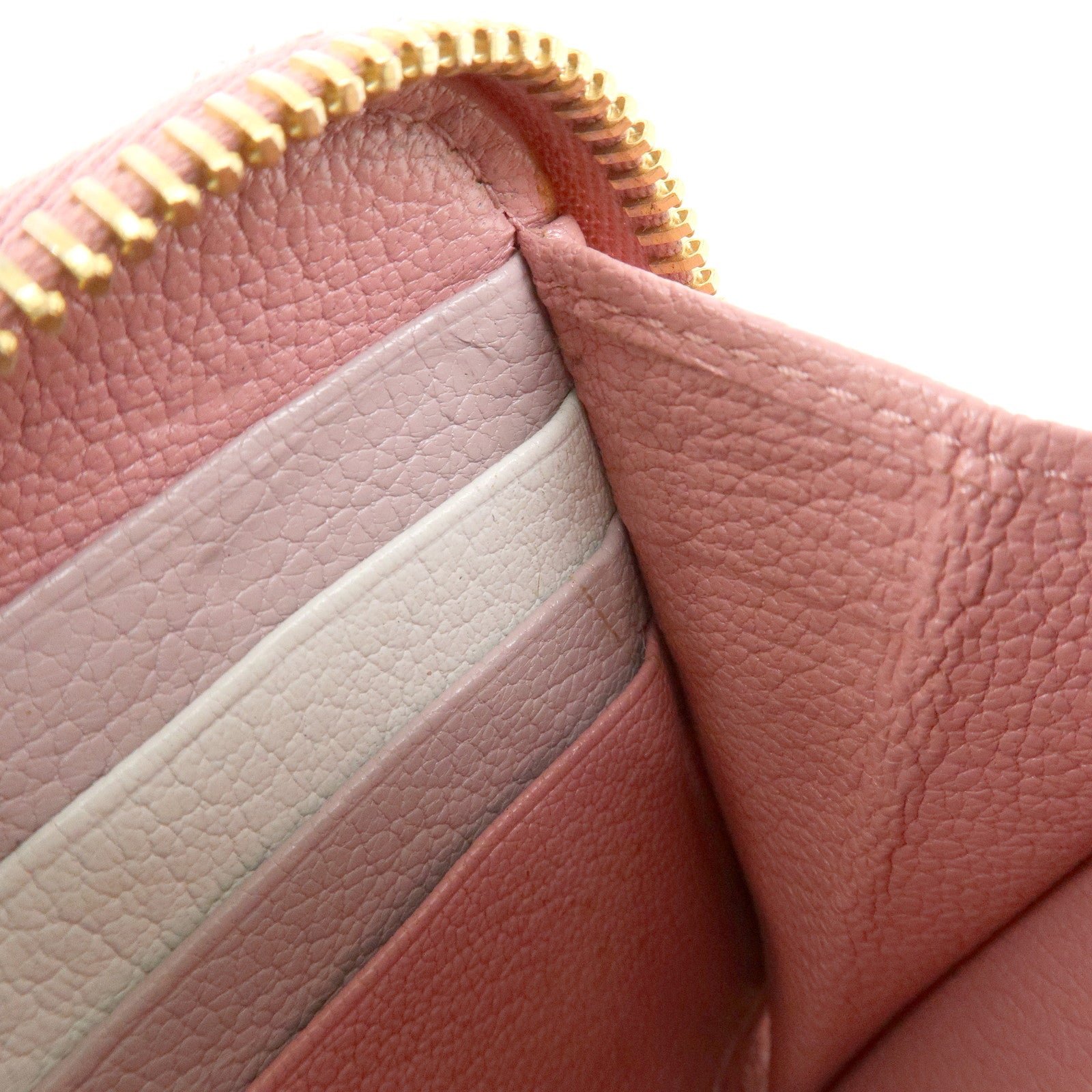 miu miu leather round zippy wallet long wallet pink 5ml506 used miu miu leather round zippy wallet long wallet pink 5ml506 used