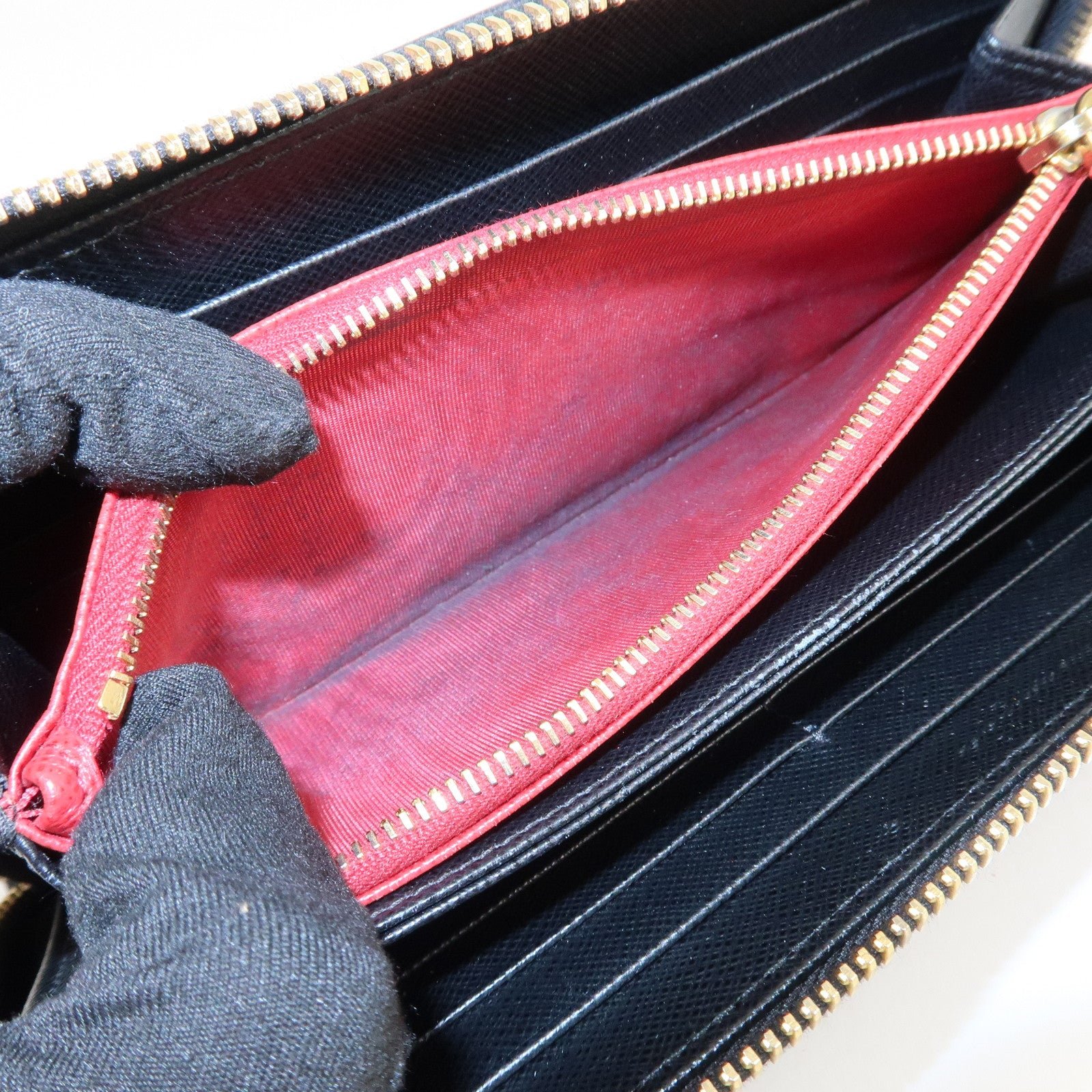 prada logo saffiano leather zippy long wallet black 1ml506 prada logo saffiano leather zippy long wallet black 1ml506