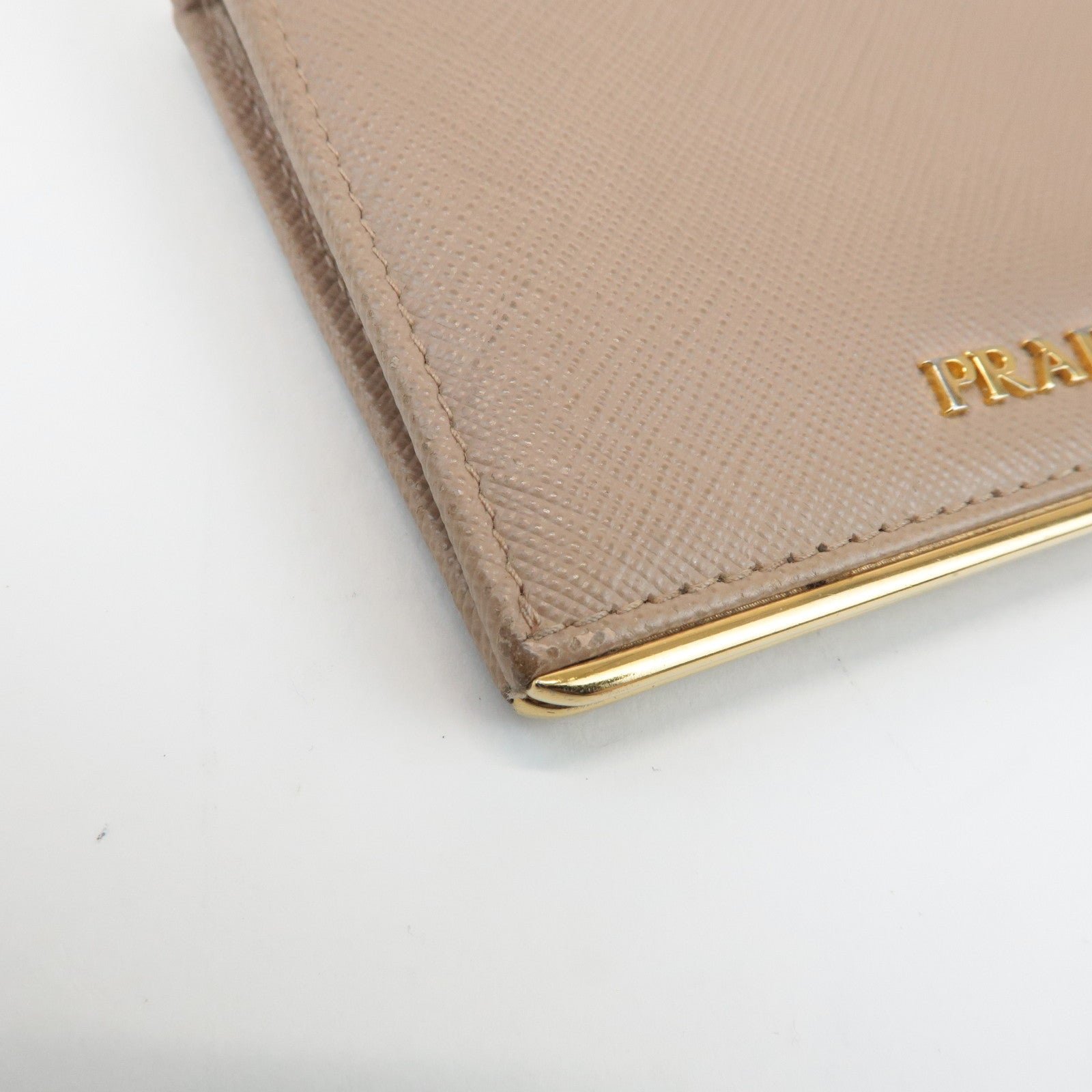 prada logo saffiano leather bi fold small wallet beige 1mv204 used prada logo saffiano leather bi fold small wallet beige 1mv204 used
