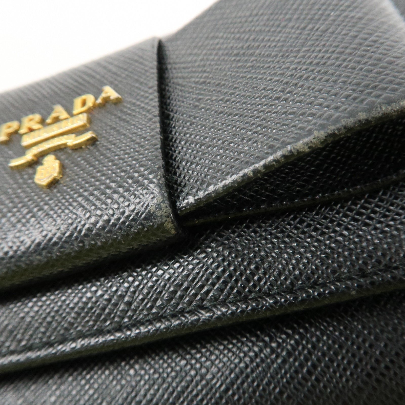 prada saffiano leather flap bi fold long wallet black gold 1mh132 used prada saffiano leather flap bi fold long wallet black gold 1mh132 used