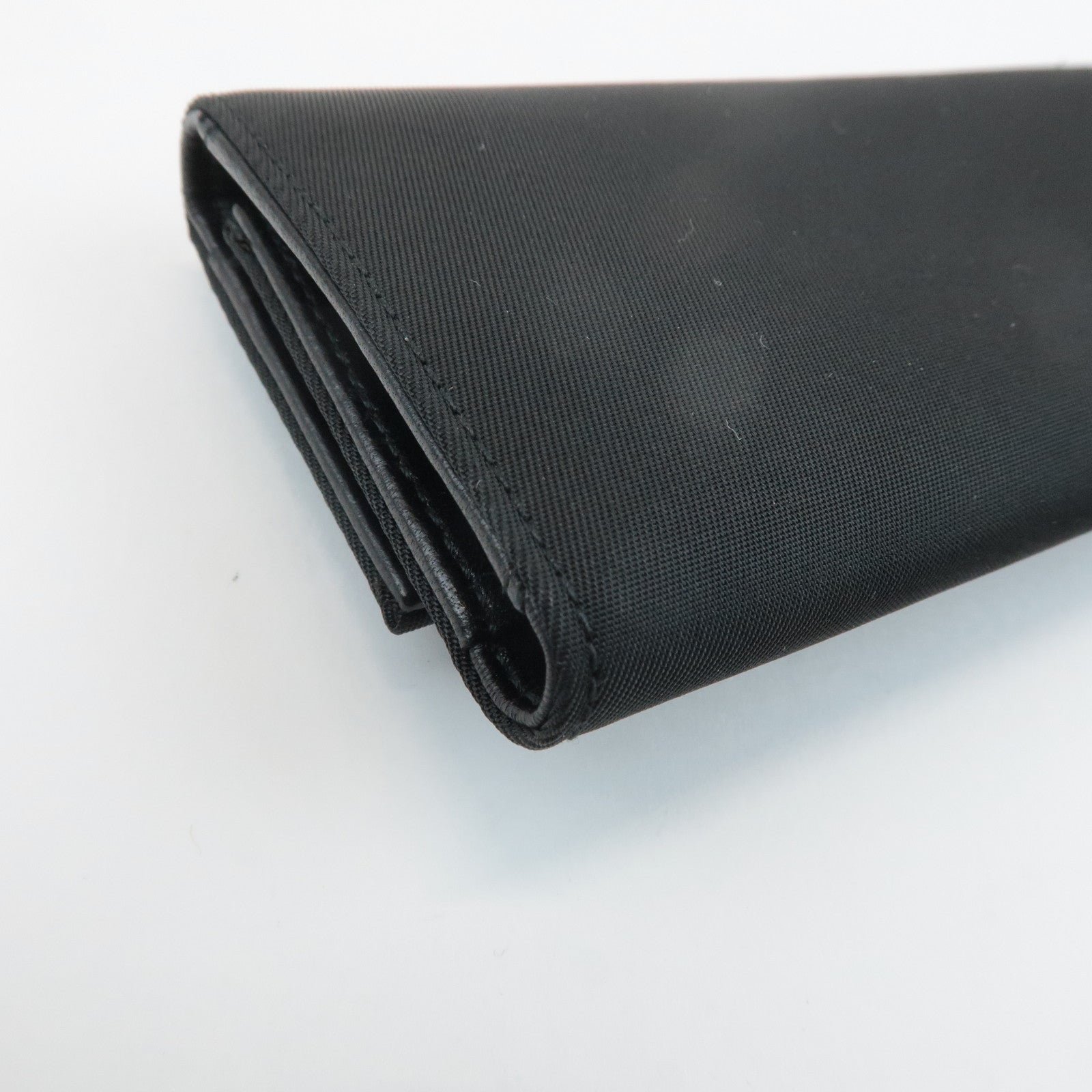 prada triangle logo nylon 6 key case key holder black m26x used prada triangle logo nylon 6 key case key holder black m26x used