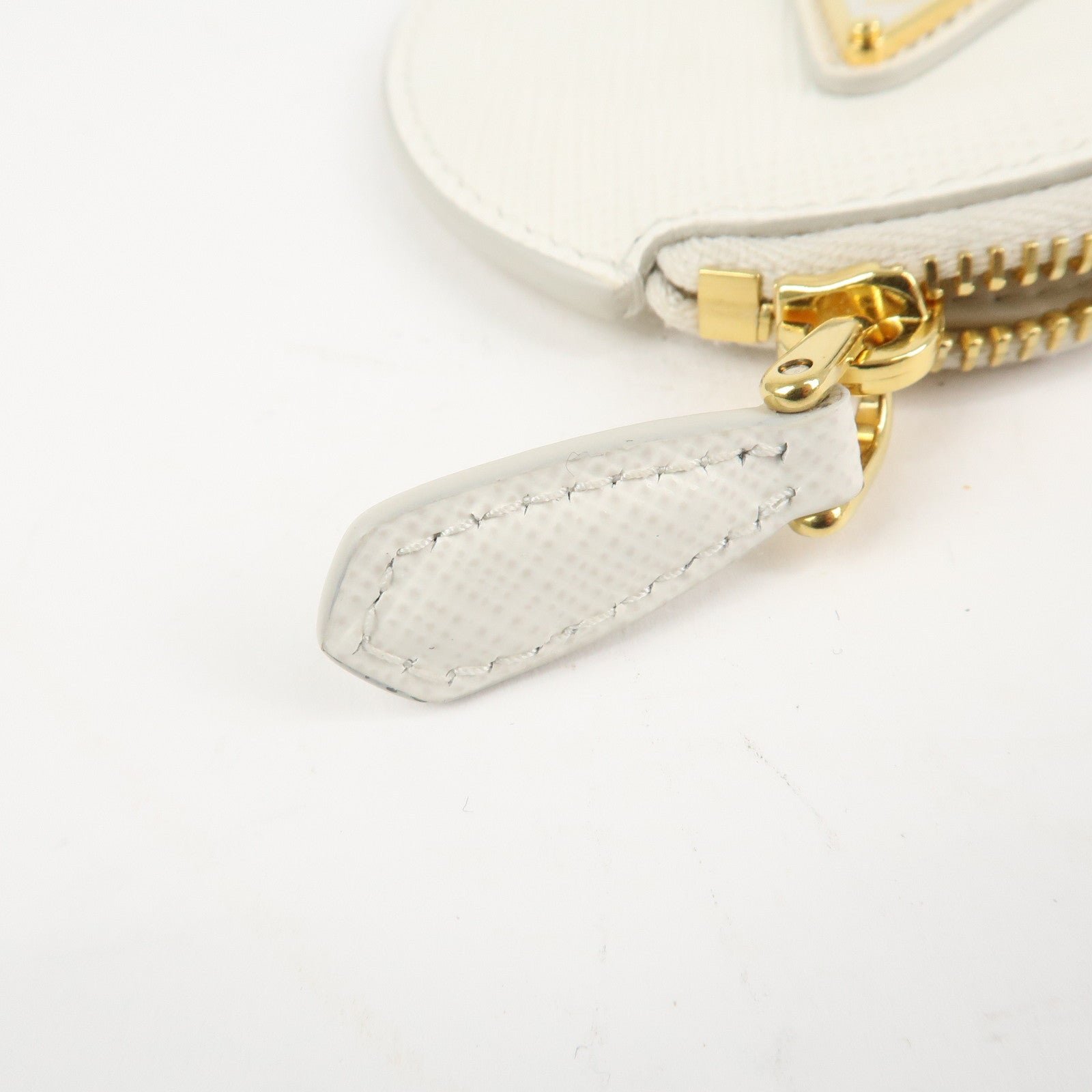 prada triangle logo saffiano leather coin case white 1mm006 used prada triangle logo saffiano leather coin case white 1mm006 used