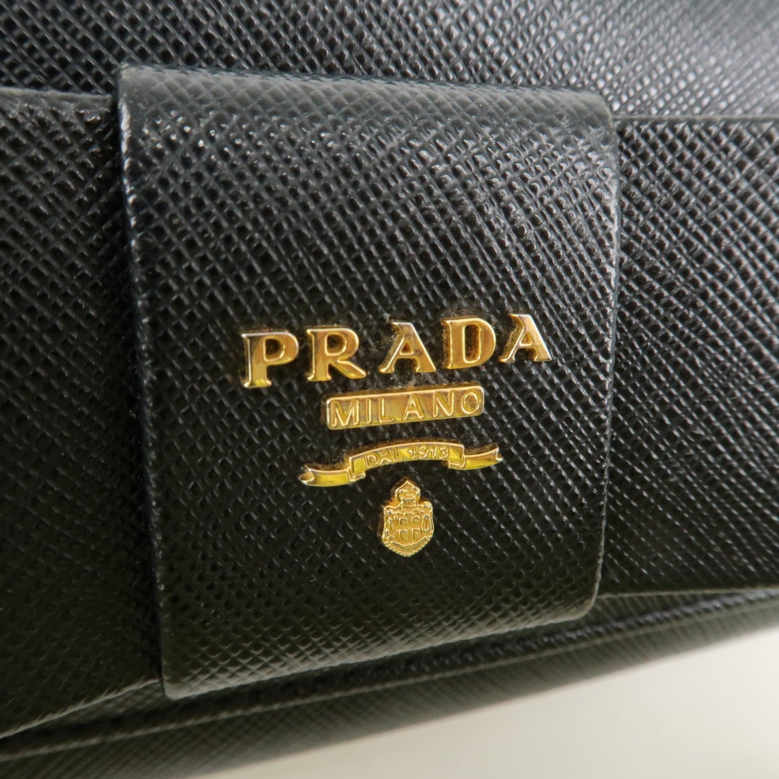 prada saffiano leather flap bi fold long wallet black gold 1mh132 used prada saffiano leather flap bi fold long wallet black gold 1mh132 used