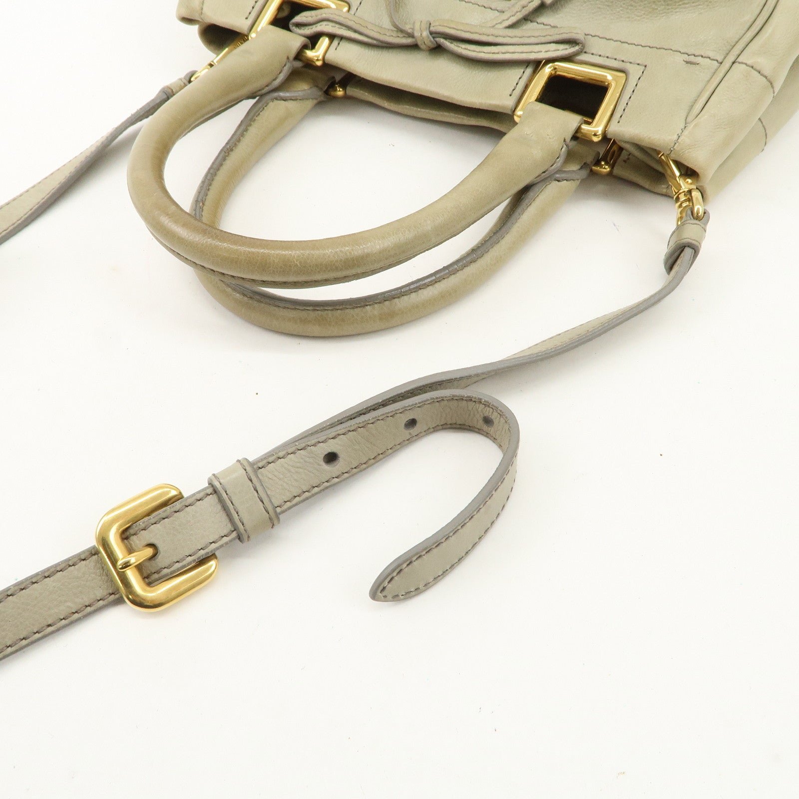 prada logo ribon leather 2way tote bag hand bag beige gold hdw bn2245 used prada logo ribon leather 2way tote bag hand bag beige gold hdw bn2245 used