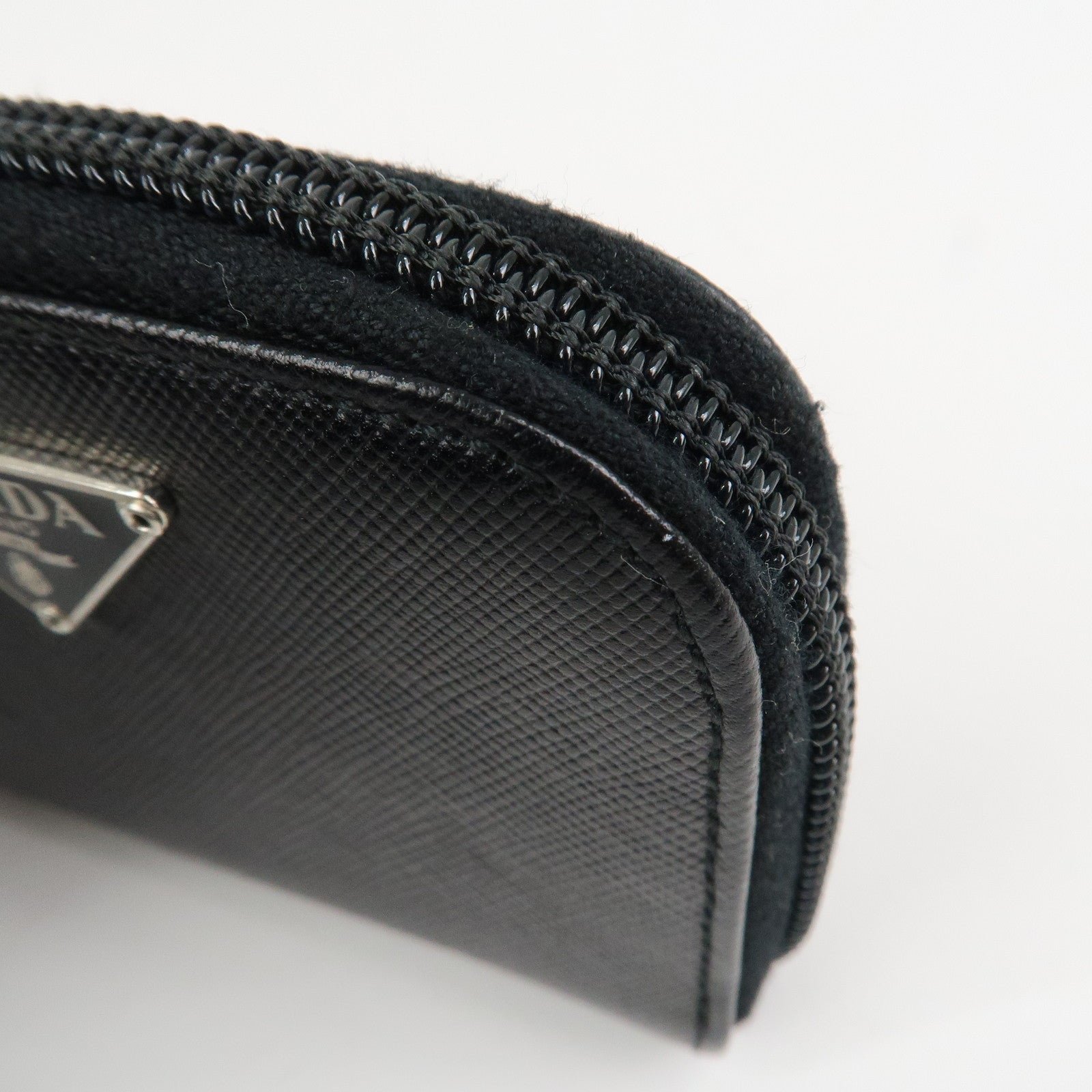 prada triangle logo saffiano leather round zippy coin case black prada triangle logo saffiano leather round zippy coin case black