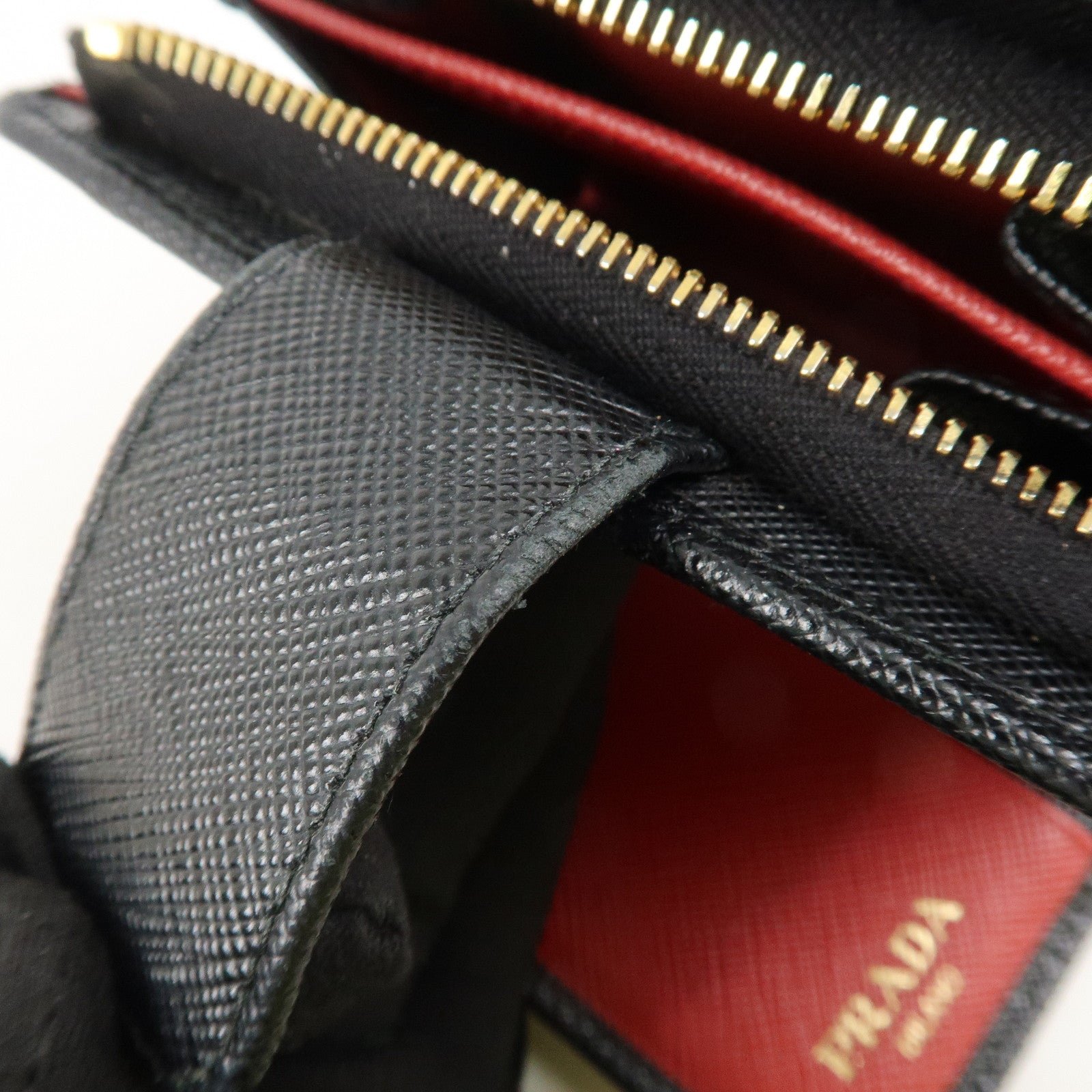 prada saffiano leather bi fold wallet black red gold 1ml018 used prada saffiano leather bi fold wallet black red gold 1ml018 used