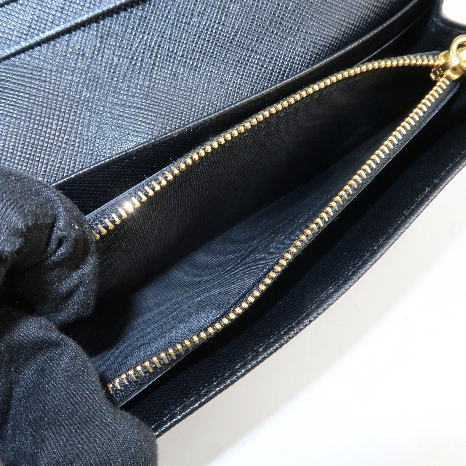 prada saffiano leather flap bi fold long wallet black gold 1mh132 used prada saffiano leather flap bi fold long wallet black gold 1mh132 used