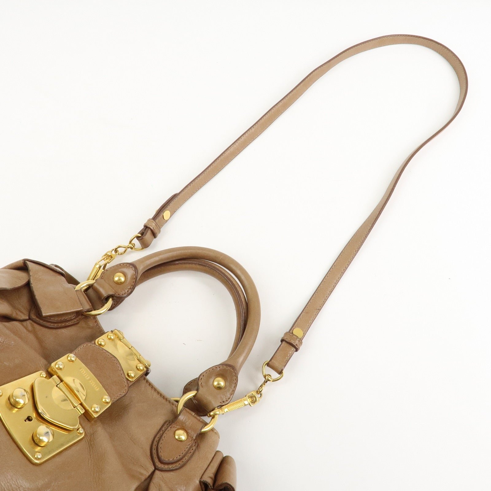 miu miu leather side ribbon 2way bag hand bag beige gold miu miu leather side ribbon 2way bag hand bag beige gold