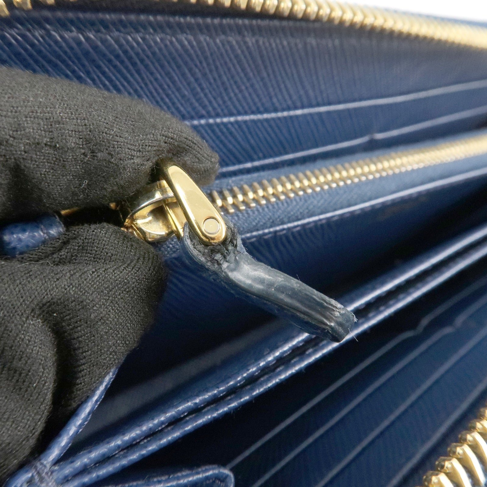 prada triangle logo saffiano leather zippy long wallet navy 1ml506 prada triangle logo saffiano leather zippy long wallet navy 1ml506