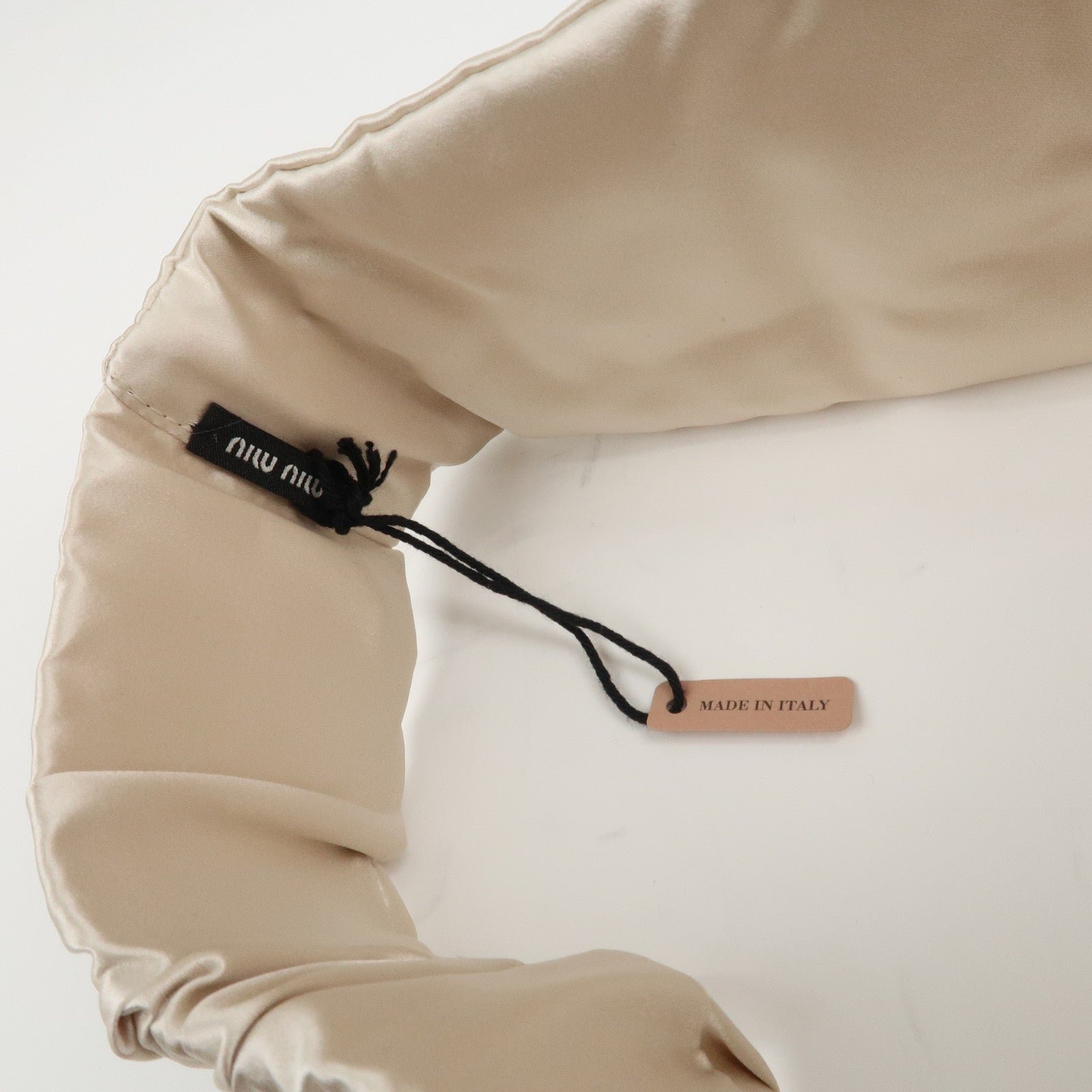 miu miu matelasse leather pouch silk eye mask gold used miu miu matelasse leather pouch silk eye mask gold used