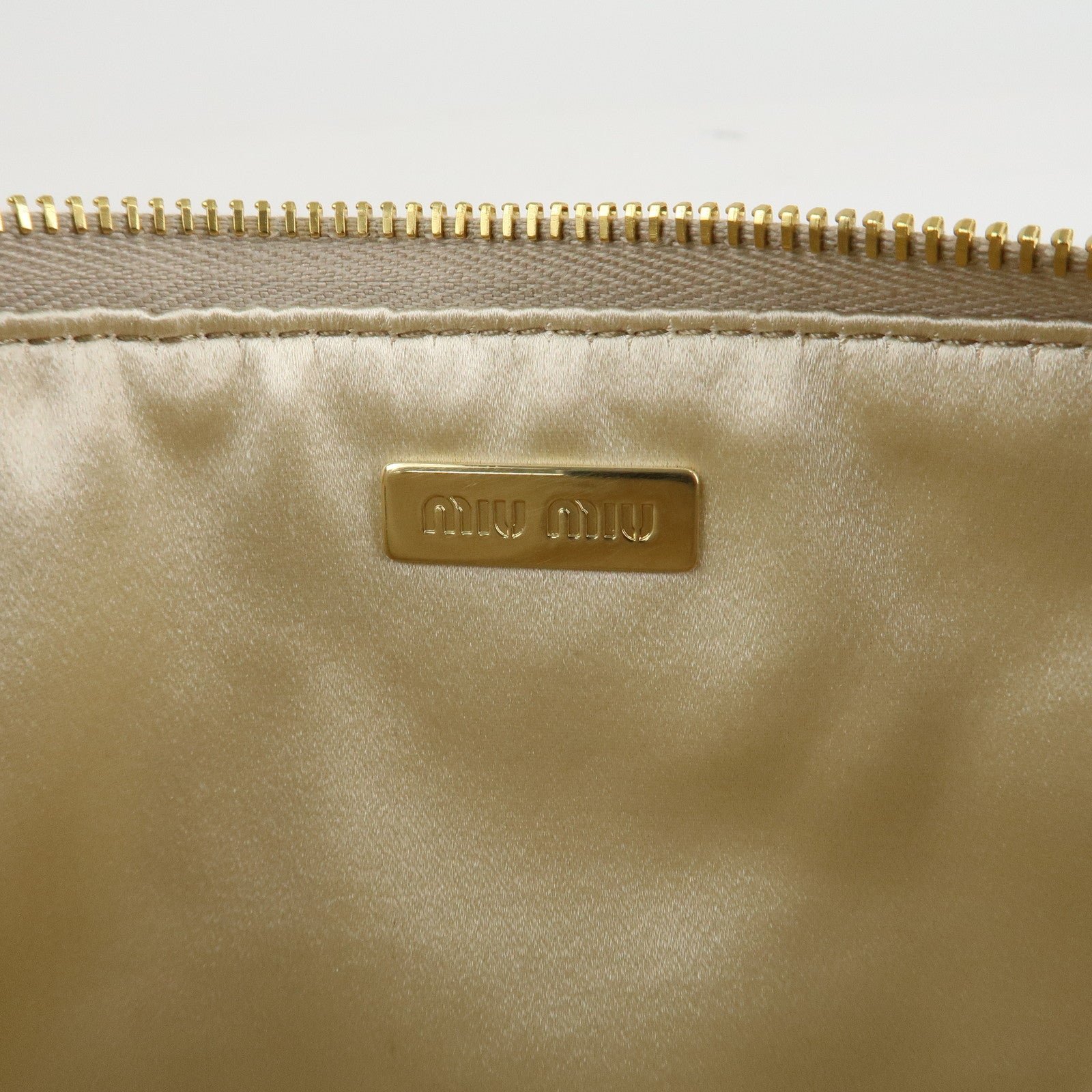 miu miu matelasse leather pouch silk eye mask gold used miu miu matelasse leather pouch silk eye mask gold used