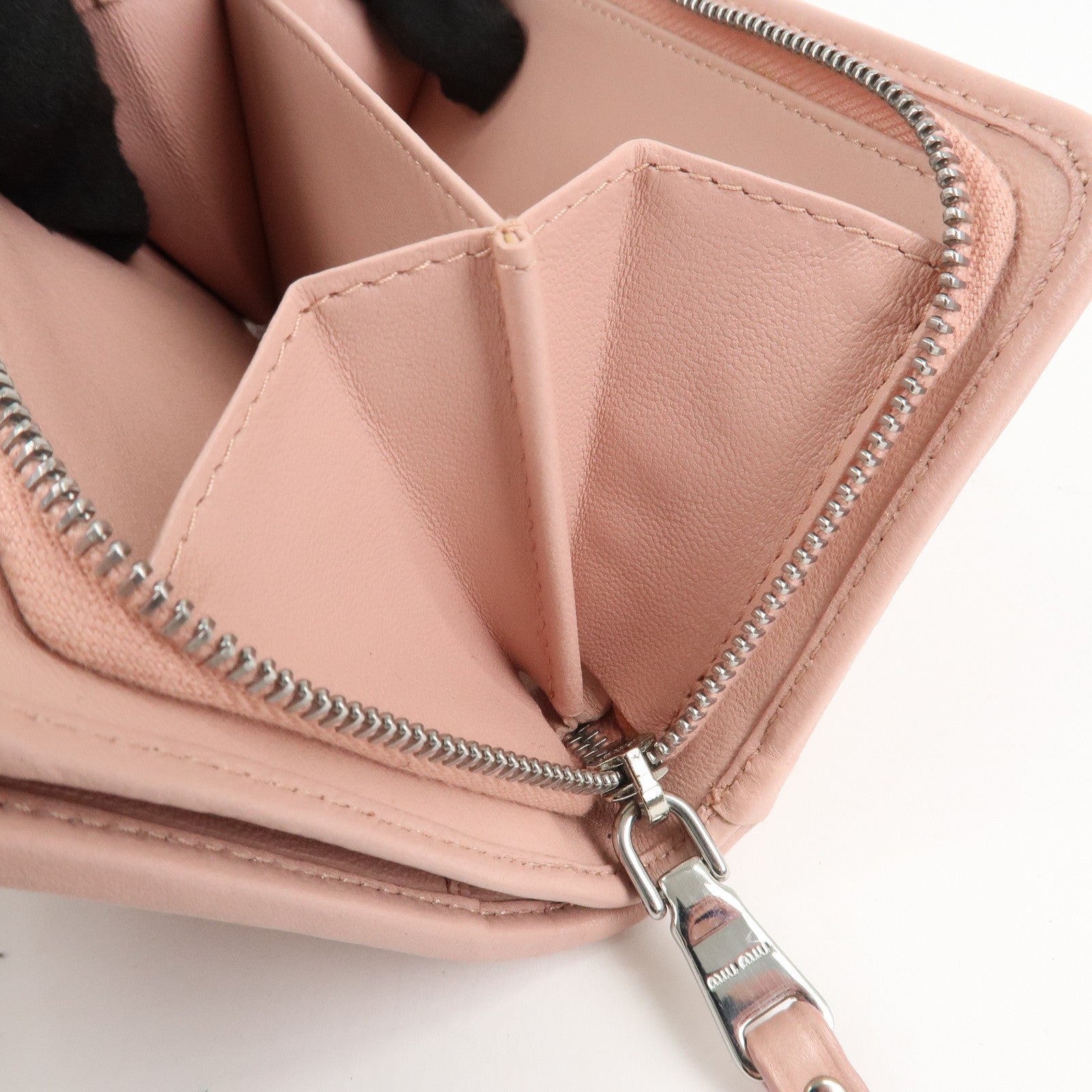 miu miu matelasse leather tri fold wallet pink used miu miu matelasse leather tri fold wallet pink used