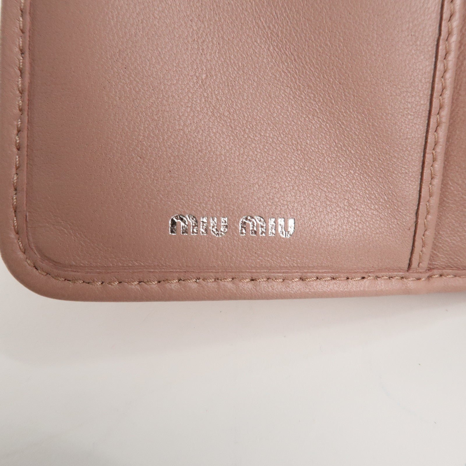 miu miu matelasse leather tri fold wallet pink used miu miu matelasse leather tri fold wallet pink used