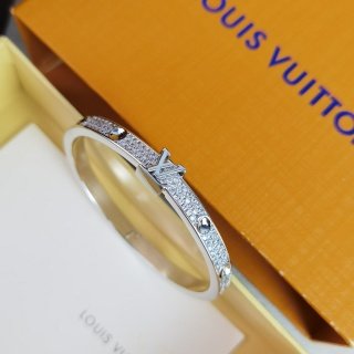 empreinte medium bangle, white gold and diamonds empreinte medium bangle, white gold and diamonds
