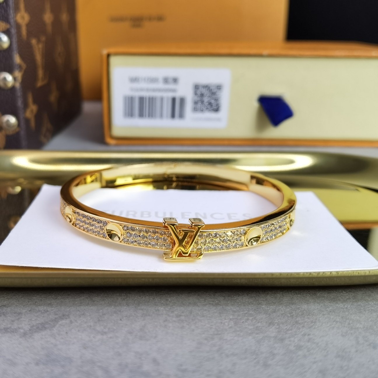 empreinte medium bangle, white gold and diamonds empreinte medium bangle, white gold and diamonds